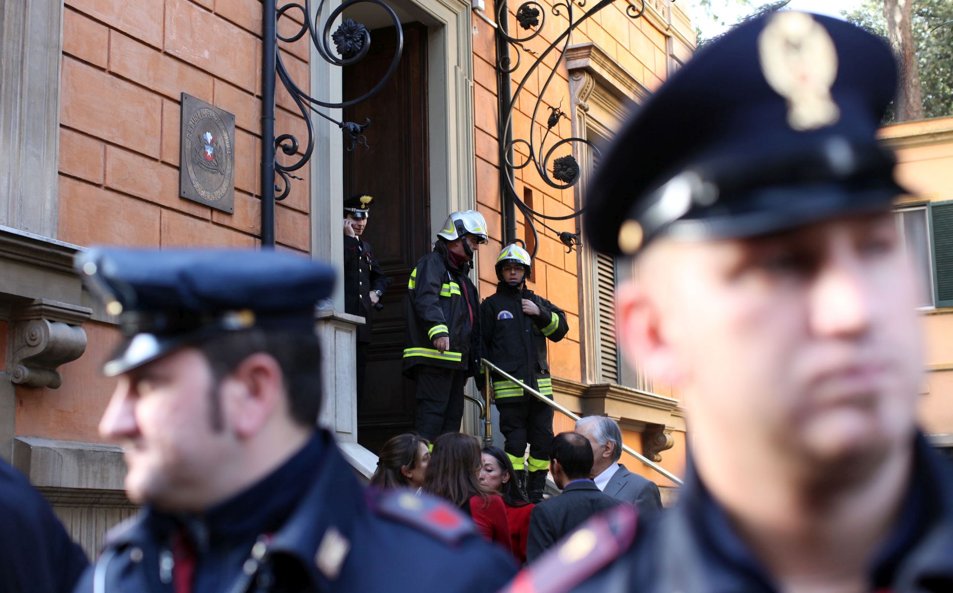 ROME, ITALY - DECEMBER 23:  Carabinierei stands in front of the Chilean Embassy were a parcel bomb exploded earlier on December 23, 2010 in Rome, Italy. The bomb, believed to be the work of anarchists, injured one person and follows another earlier in the day at the Swiss Embassy.   (Photo by Franco Origlia/Getty Images)