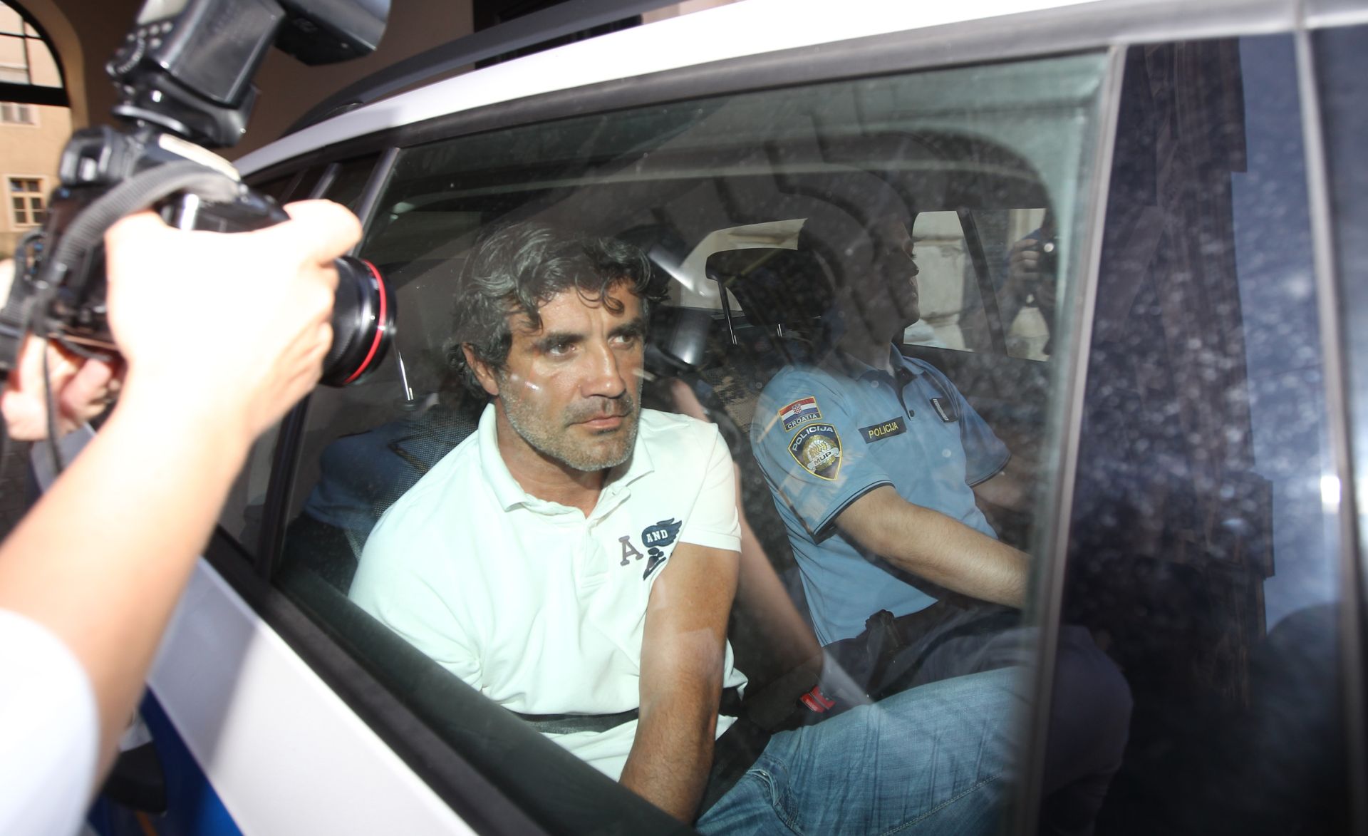 04.07.2015. Zagreb- Policija odvozi Zorana Mamica nakon sto je ispitan u USKOK-u
Photo: Boris Scitar/Vecernji list
