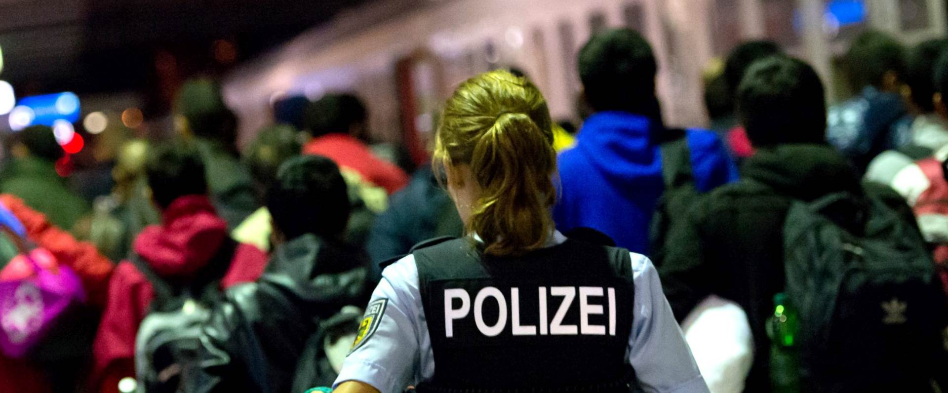 epa04928264 Refugees board a special train to Dortmund at the main station in Munich, Germany, 13 September 2015. About 13,00 refugees were expected to reach Munich's main railway station on 12 September, as local officials warned of a lack of accommodation for the new arrivals in the Bavarian capital.  EPA/SVEN HOPPE