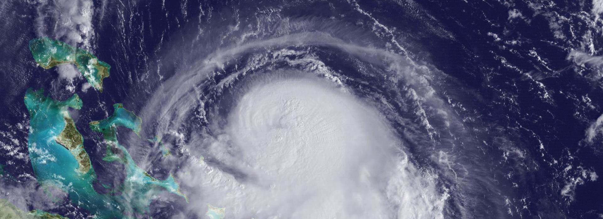 epa04958302 A handout picture made available by the National Oceanic and Atmospheric Administration (NOAA) on 01 October 2015 shows a satellite image acquired by GOES East of Hurricane Joaquin in the Western Atlantic Ocean, 30 September 2015. Joaquin's winds have increased to hurricane strength making the storm the third hurricane of the 2015 Atlantic hurricane season. According to media reports on 01 October, Hurricane Joaquin, currently a Category three storm, is heading towards the Bahamas with heavy rain and storm surges.  EPA/NOAA  HANDOUT EDITORIAL USE ONLY
