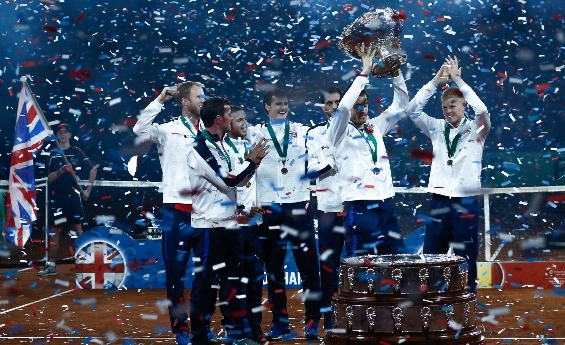 epa05047437 Britain's team celebrates winning the  Davis Cup World Group Final between Belgium and Britain in Gent, Belgium, 29 November 2015.  EPA/LAURENT DUBRULE