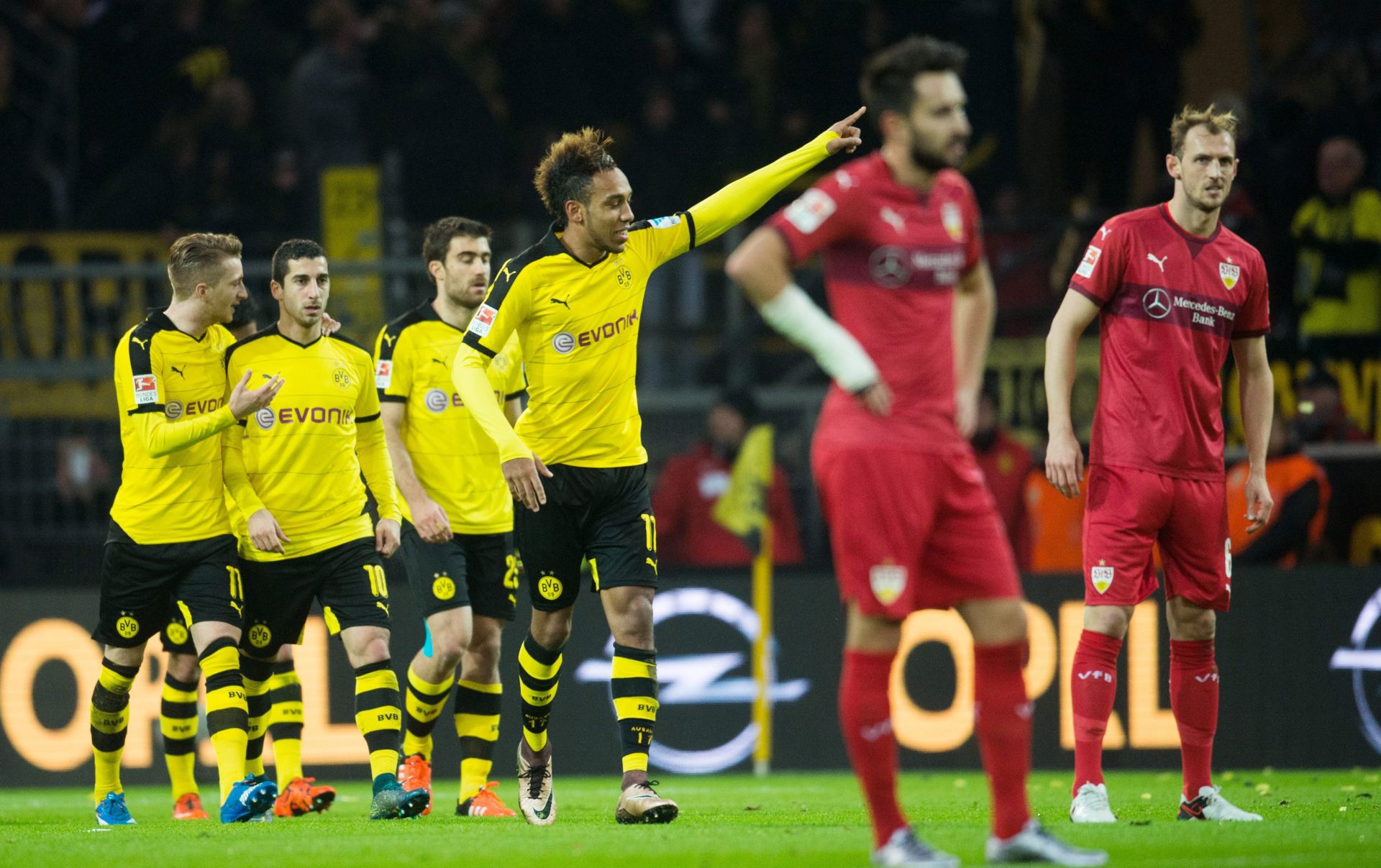 epa05047288 Dortmund's Pierre-Emerick Aubameyang celebrates his 2-0 goal during the German Bundesliga soccer match between Borussia Dortmund and VfB Stuttgart at Signal Iduna Park in Dortmund, Germany, 29 November 2015. 

(EMBARGO CONDITIONS - ATTENTION: Due to the accreditation guidelines, the DFL only permits the publication and utilisation of up to 15 pictures per match on the internet and in online media during the match.)  EPA/Bernd Thissen