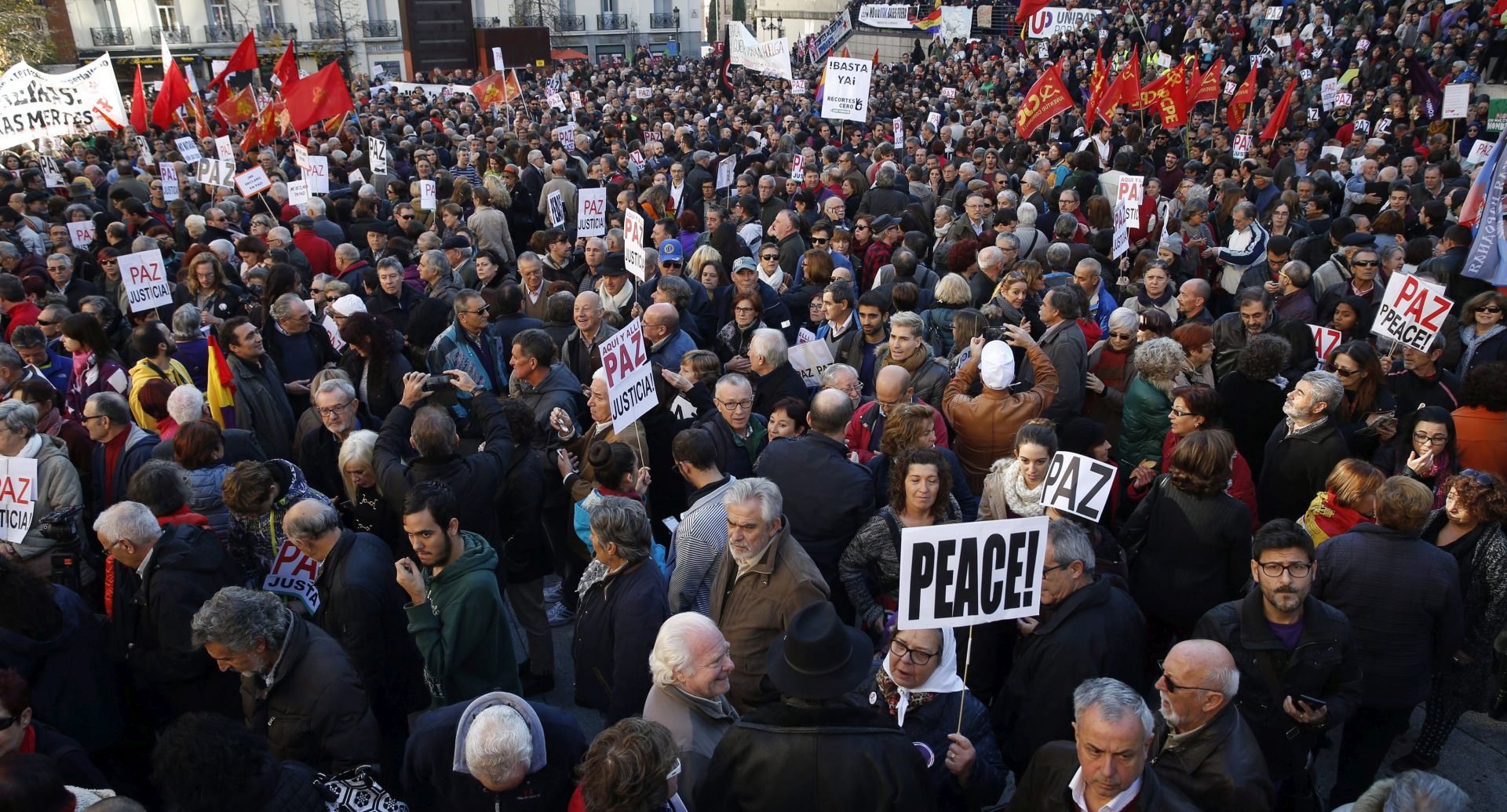 epa05045612 Hundreds attend a gathering in front of the Reina Sofia Museum in Madrid, Spain, on 28 November 2015, called by the people signing the manifesto 'Not in Our Name' to protest against military intervention in Syria. Politics, actors and other personalities such as Madrid's Mayoress Manuela Carmena, Barcelona's Mayoress Ada Colau, Spanish actress Pilar Bardem and the President of the 11-M Victim Association, Pilar Manjon, have signed the manifesto 'Not in Our Name' to protest against terrorism, wars and islamophobia. According to this manifesto the response to Paris attacks cannot be with "more violence and hate".  EPA/J. J. GUILLEN