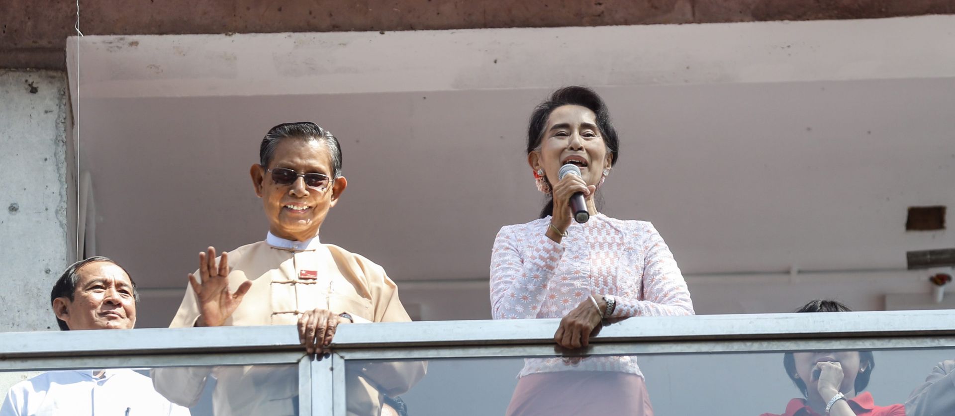 epa05017569 Myanmar opposition leader Aung San Suu Kyi (R), chairperson of National League for Democracy (NLD) party, delivers a speech as Tin Oo (L), patron of the NLD, stands beside her at the NLD headquarters in Yangon, Myanmar, 09 November 2015. Myanmar opposition leader Aung San Suu Kyi hints at victory in her first address since the polls closed a day earlier. 'It is too early to congratulate our candidates that will be victors,' she said at the headquarters of her National League for Democracy party, 'but I think you all have an idea of the results.' She asked her supporters to not be boastful if they win or make the losers 'feel bad.'  EPA/LYNN BO BO