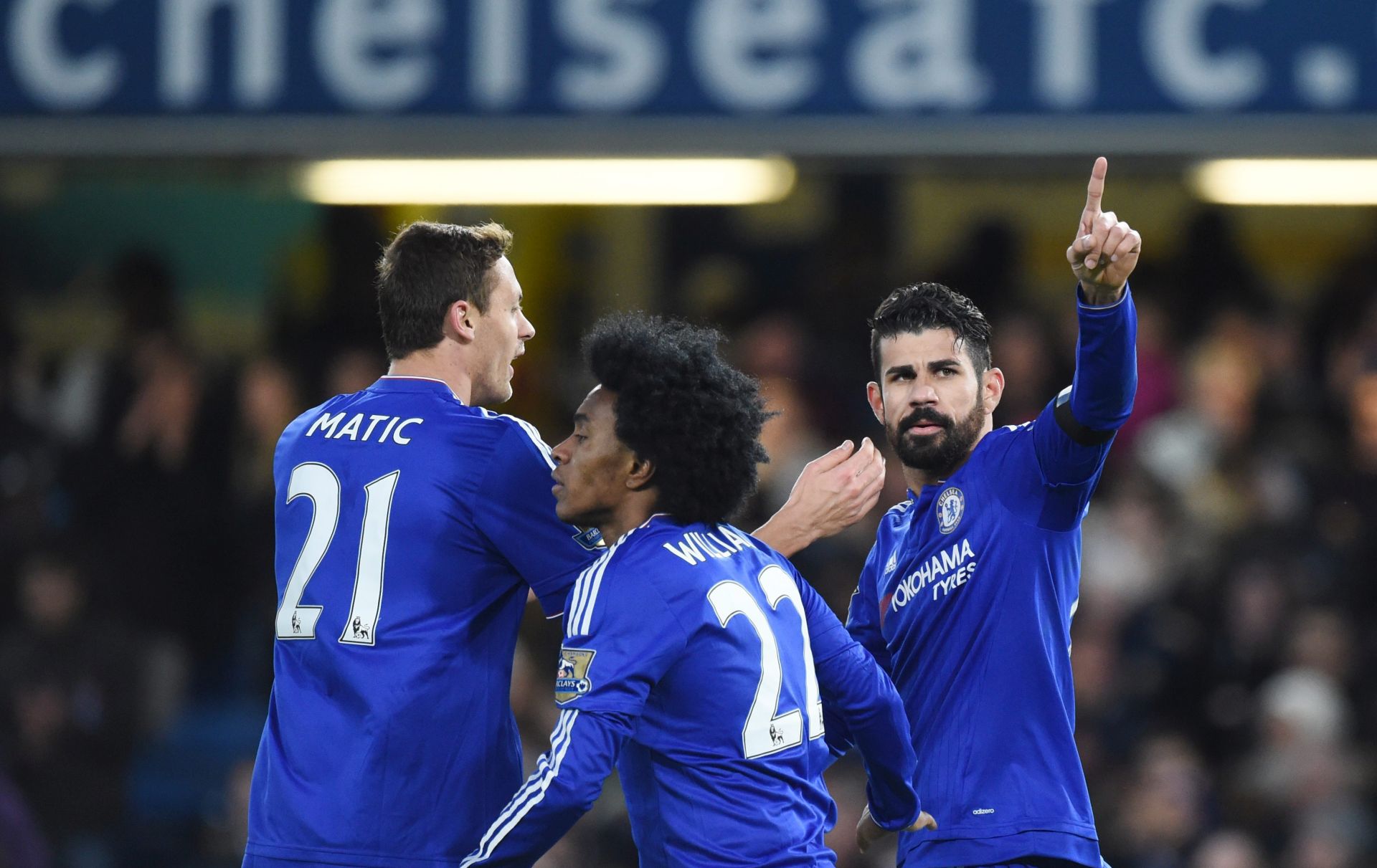 epa05036052 Chelsea Diego Costa (R) celebrates after scoring a goal during the English Premier League soccer match between Chelsea and Norwich City at Stamford Bridge in London, Britain, 21 November 2015.  EPA/FACUNDO ARRIZABALAGA EDITORIAL USE ONLY. No use with unauthorized audio, video, data, fixture lists, club/league logos or 'live' services. Online in-match use limited to 75 images, no video emulation. No use in betting, games or single club/league/player publications