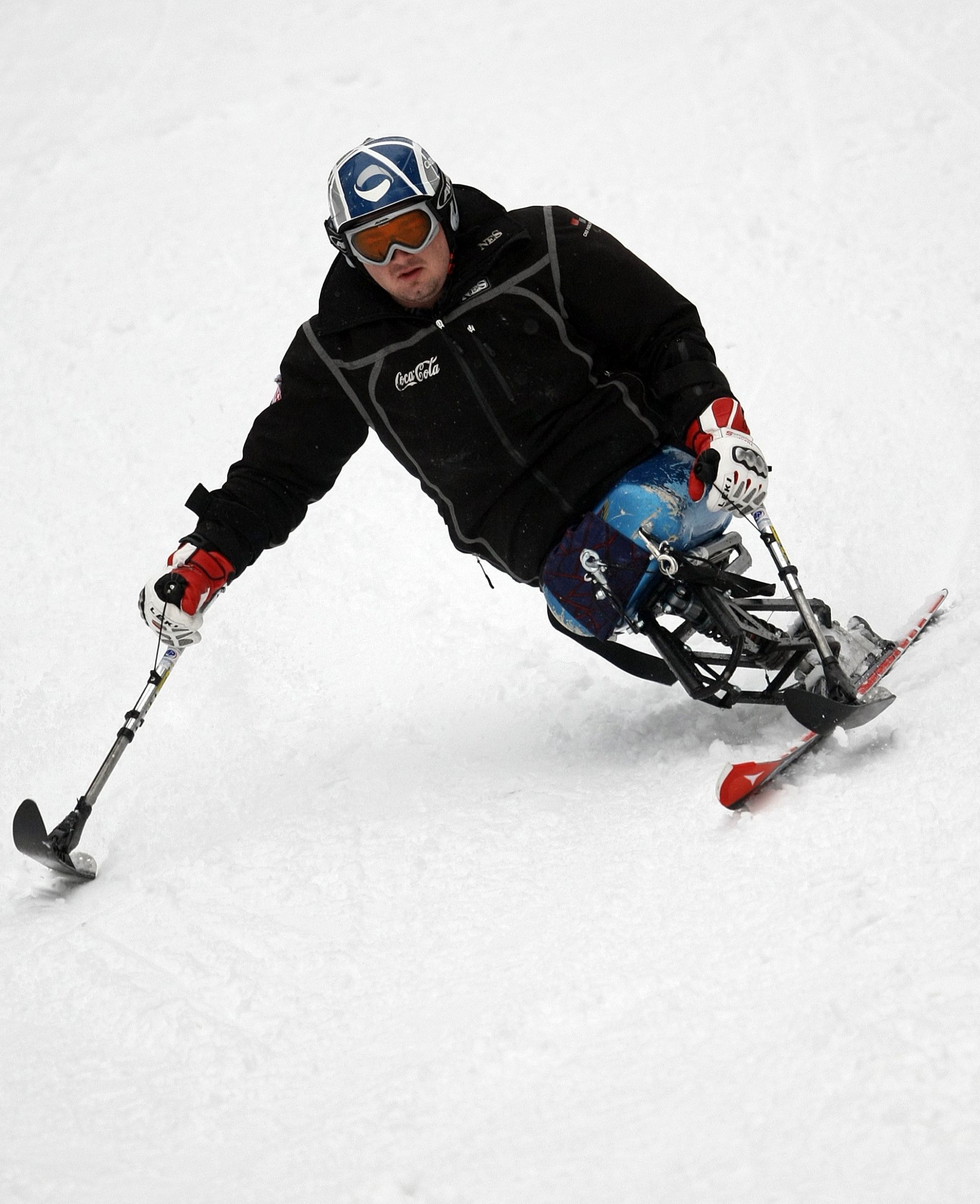 05.02.2010., Zagreb - Sljeme, pripreme Hrvatske paraolimpijske skijaske reprezentacije za olimpijske igre u Vancouveru. Dino Sokolovic nema ni jednu nogu-sjedi na monoski-ju.
Photo: Sanjin Strukic/PIXSELL