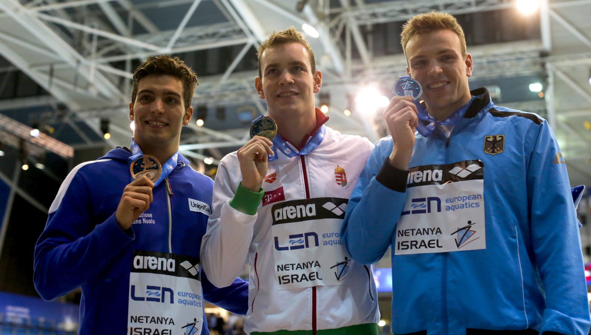 epa05052345 Peter Bernek of Hungary's gold medalist (C), Paul Biedermann of Germany's silver medalist (L) Gabriele Detti of Italy bronze medalist (R) won in the men's 400m freestyle final at the LEN European Short Course Swimming Championships in Netanya, Israel, 2 December 2015.  EPA/ATEF SAFADI
