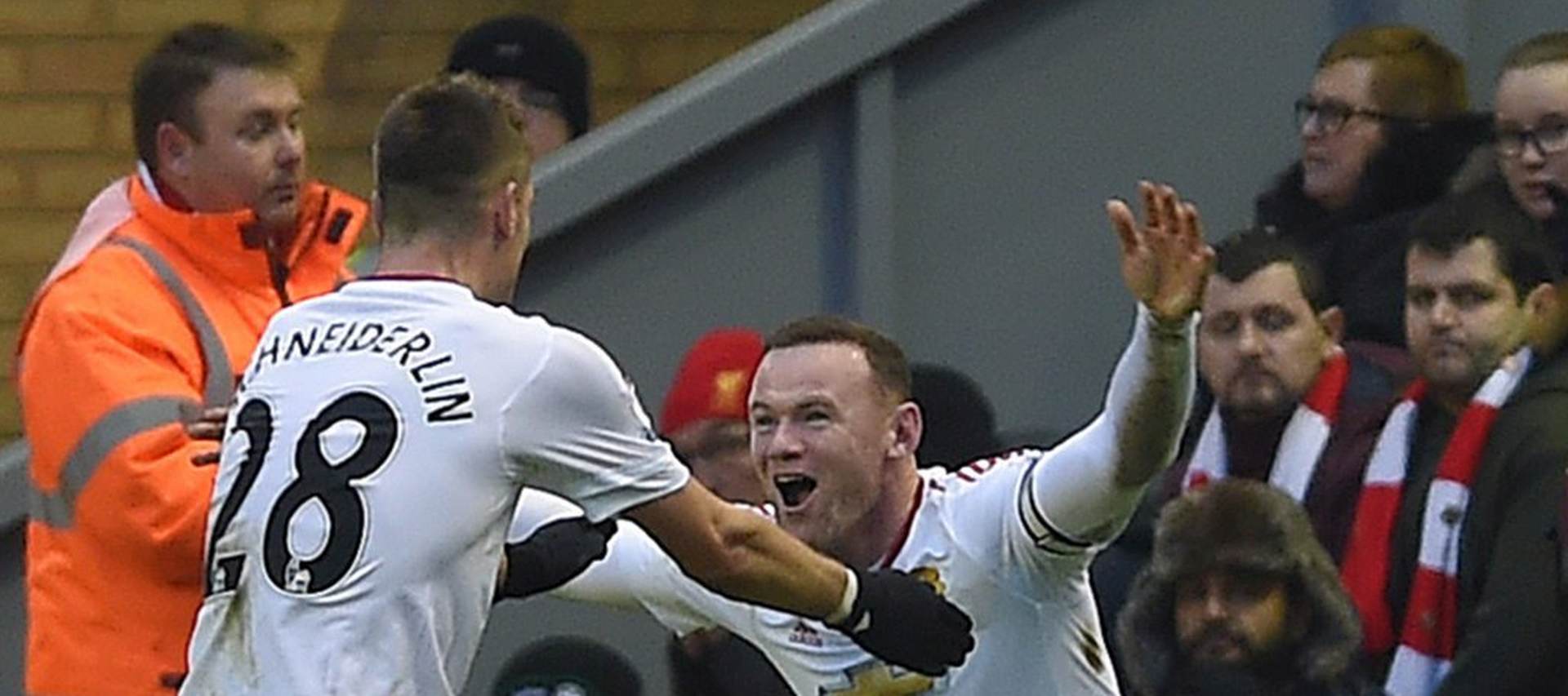 epa05107027 Manchester United's Wayne Rooney (R) is congratulated by Morgan Schneiderlin (L) after scoring the opening goal during the English Premier League soccer match between Liverpool and Manchester United at Anfield, Liverpool, Britain, 17 January 2016.  EPA/PETER POWELL EDITORIAL USE ONLY. No use with unauthorized audio, video, data, fixture lists, club/league logos or 'live' services. Online in-match use limited to 75 images, no video emulation. No use in betting, games or single club/league/player publications.