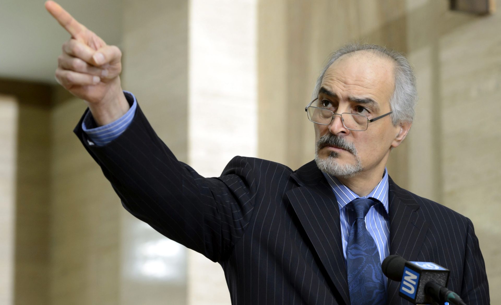 epa05139709 Syrian government chief negotiator Bashar al-Jaafari, Ambassador of the Permanent Representative Mission of the Syria to UN New York speaks to the press after a round of talks with UN peace envoy Staffan de Mistura at the European headquarters of the United Nations in Geneva, Switzerland, 02 February 2016. De Mistura met with the delegation of the Syrian government on 02 February, one day after meeting with Syrian opposition delegates as part of efforts to resolve the multi-sided conflict in Syria, estimated to have killed more than 250,000 people and driven more than 11 million from their homes since 2011.  EPA/LAURENT GILLIERON