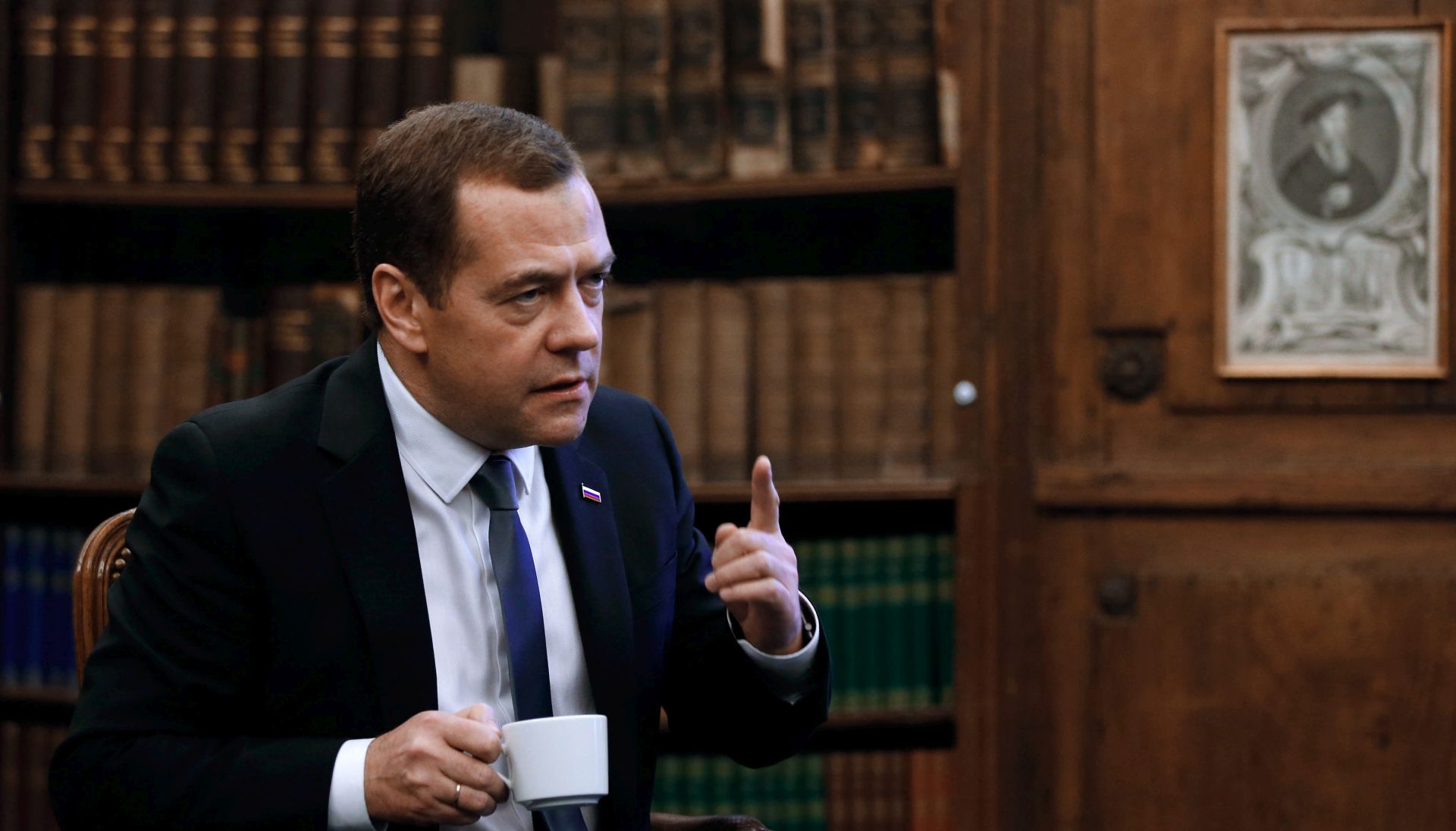 epa05161828 A picture made available on 15 February 2016 shows Russian Prime Minister Dmitry Medvedev gesturing during an interview with TIME magazine on the sidelines of the 52nd Munich Security Conference in Munich, Germany, 13 February 2016.  EPA/DMITRY ASTAKHOV / SPUTNIK  / GOVERNMENT PRESS SERVICE POOL MANDATORY CREDIT