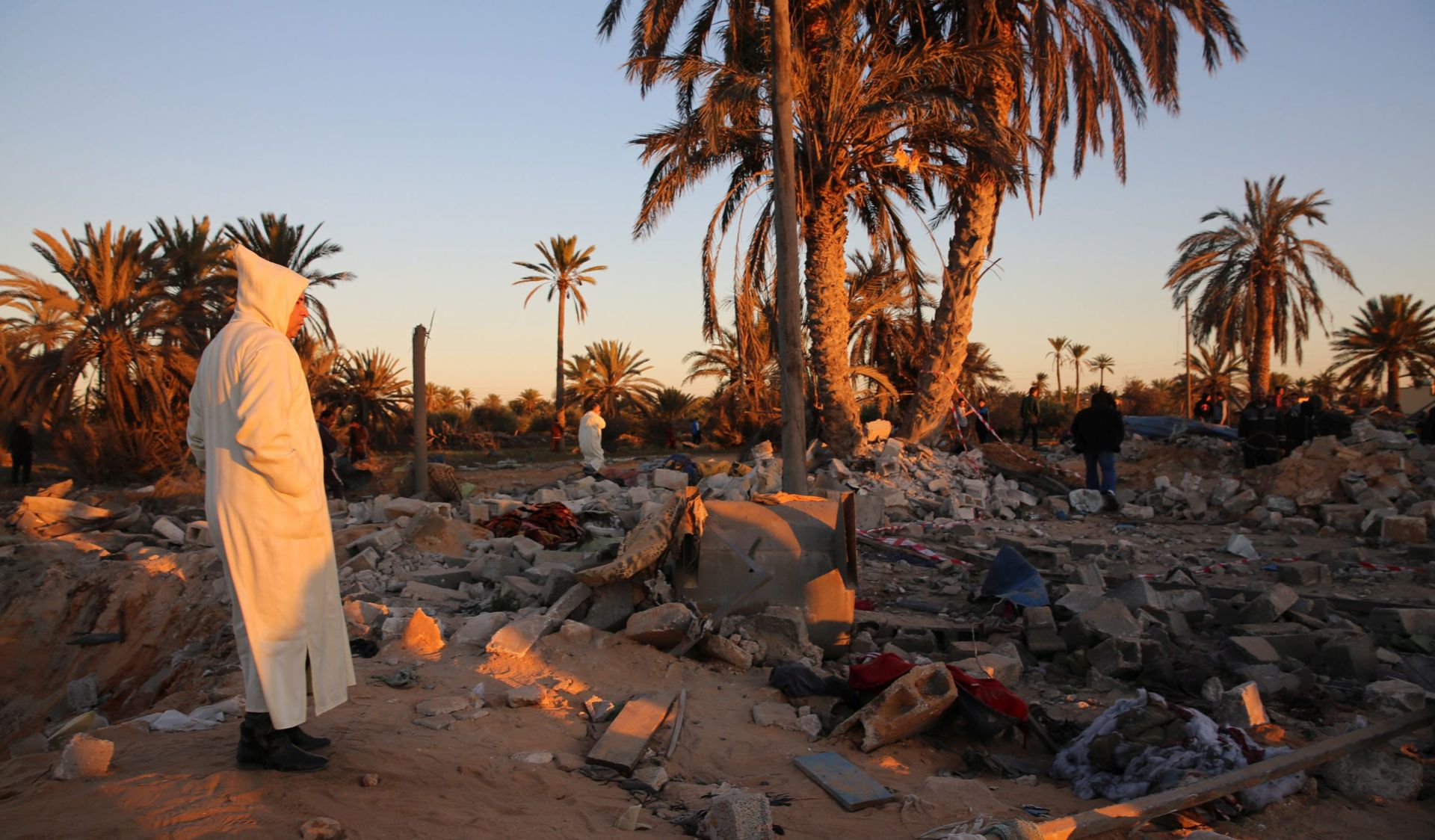 epa05171192 A view shows damage at the scene after an airstrike by US warplanes against a jihadist training camp in Sabratha, Libya, 19 February 2016. According to media reports, the US launched an airstrike against an alleged Islamic State training camp in Libya, with local hospital sources saying 40 people were killed.  EPA/STRINGER
