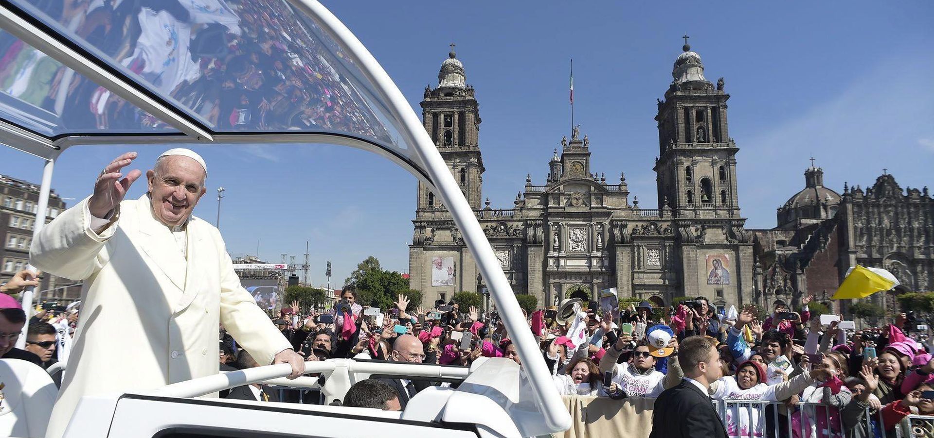epa05160003 A handout picture provided by the Vatican newspaper L'Osservatore Romano on 14 February 2016 shows Pope Francis waving to faithful from the popemobile as he heads to the cathedral for a meeting with Mexican bishops in Mexico City, Mexico, 13 February 2016. Pope Francis landed in the Mexican capital late 12 February for his first visit to the predominantly Catholic country. His tour will last until 17 February, and take him to six cities in four states. The pope has spoken out against the high rates of crime and poverty in the country.  EPA/OSSERVATORE ROMANO/HANDOUT  HANDOUT EDITORIAL USE ONLY/NO SALES