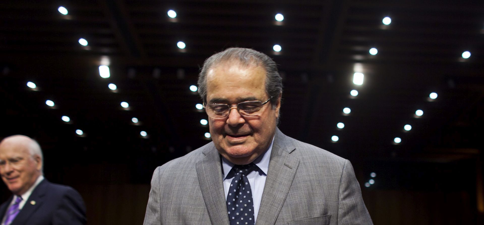 epa05159264 (FILE) A file photo dated 05 October 2011 shows Supreme Court Justice Antonin Scalia making a rare appearance on Capitol Hill to testify before a Senate Judiciary Committee hearing on "Considering the Role of Judges Under the Constitution of the United States" in the Dirksen Senate Office Building in Washington, DC, USA. Reports state on 13 February 2016 state that Antonin Scalia has been found dead at a resort ranch in Texas, age 79.  EPA/JIM LO SCALZO