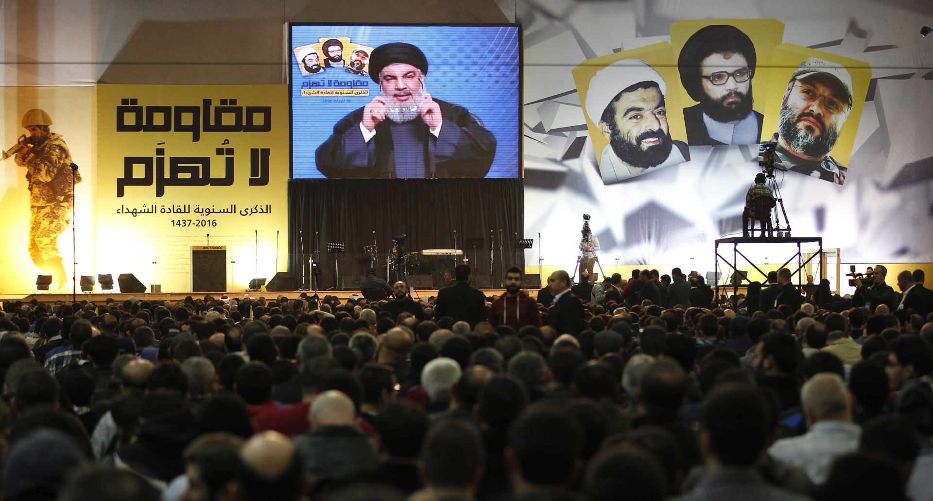 epa05165069 Supporters of Hezbollah listen to the speech of Secretary-General of "Hezbollah", Sayyed Hassan Nasrallah, during a rally in the southern suburbs of Beirut Lebanon 16 February 2016. Nasrallah  spoke about the situations in Syria ,Iraq, Yemen ,and Lebanon, and he warning Israel to don’t think to attack Lebanon.  EPA/NABIL MOUNZER