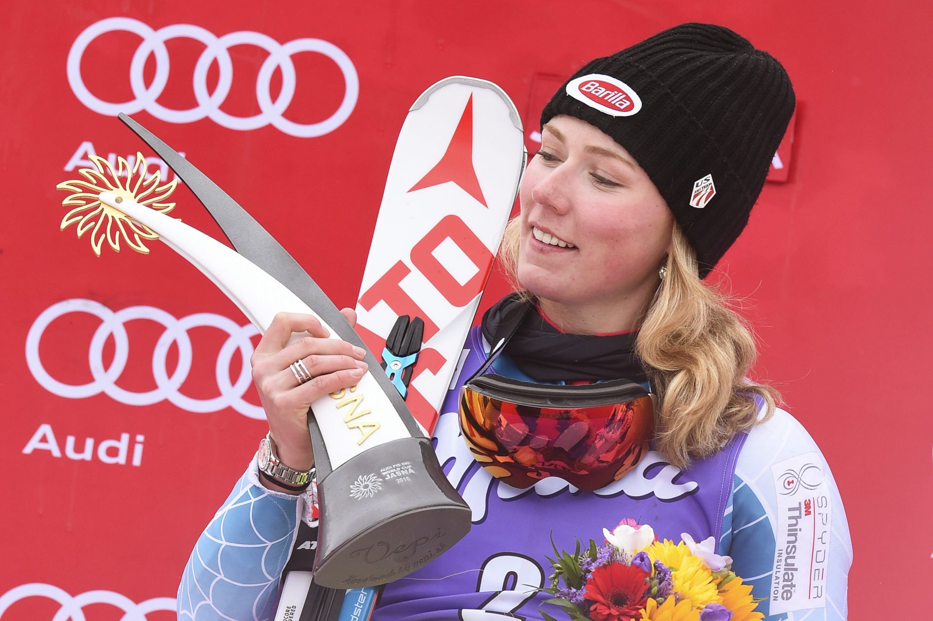 epa05197700 Mikaela Shiffrin of the USA celebrates on the podium after winning the women's Slalom race at the Alpine Skiing World Cup in Jasna, Slovakia, 06 March 2016.  EPA/VASSIL DONEV