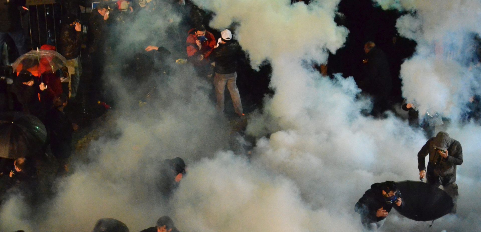 epa05195315 A handout picture released by the Zaman Daily News shows Turkish riot police raid Zaman newspaper building as they disperse supporters of Fethullah Gulen Movement protest outside of Zaman newspaper as Turkish Police try to get inside for taking over the control, in Istanbul, Turkey, 04 March 2016. The Turkish government will take control of Zaman, the largest opposition newspaper in the country, state-run Anadolu news agency reported on 04 March 2016 citing a court order. Under the order, a state appointed trusteeship will run the paper, which has editions in several languages, including Turkish and English. The staff of the Zaman newspapers in Turkey are preparing what they expect to be their final edition before government-appointed trustees take over the opposition media outlet. Zaman, which according to its own numbers averaged last year 850,000 print copies a day, is accused of being part of the network of Fethullah Gulen, an Islamic preacher based in the US.  EPA/SELMAN GUNES / ZAMAN DAILY NEWS / HANDOUT  HANDOUT EDITORIAL USE ONLY/NO SALES