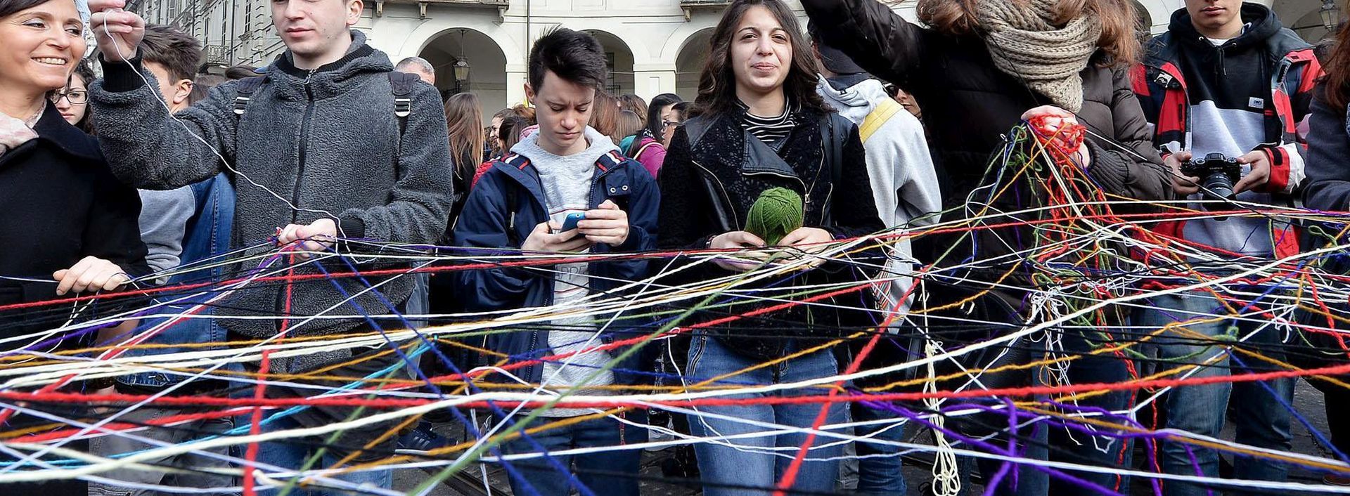 epa05224016 People take part in a march on the occasion of the remembrance and commitment national day for mafia victims in Turin, Italy, 21 March 2016. The initiative, set for the first day of spring as a sign of 'rebirth and hope', aims to give greater prominence to the fight against mafia organisations and to promote a culture of justice and legality in Italy.  EPA/ALESSANDRO DI MARCO