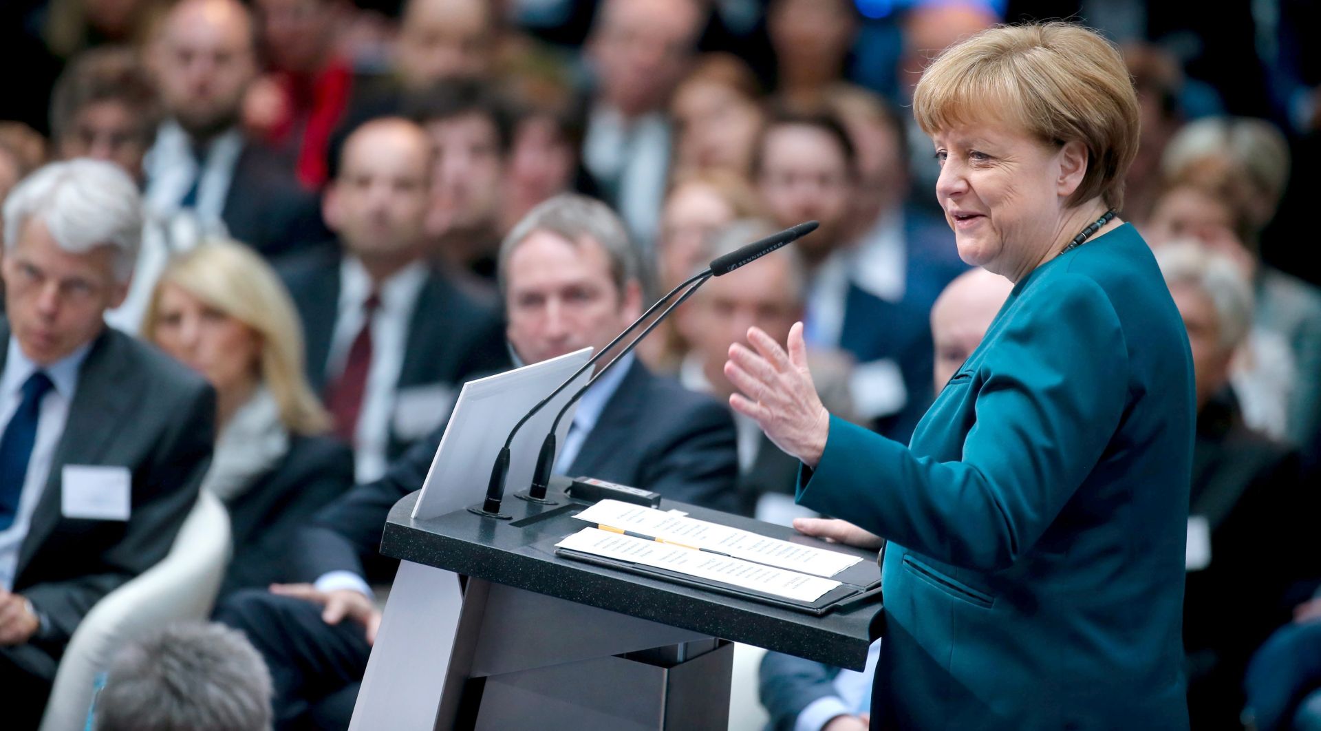 epa05255216 German Chancellor Angela Merkel speaks during the Research Summit 2016 at the Allianz forum in Berlin, Germany, 12 April 2016.  EPA/KAY NIETFELD