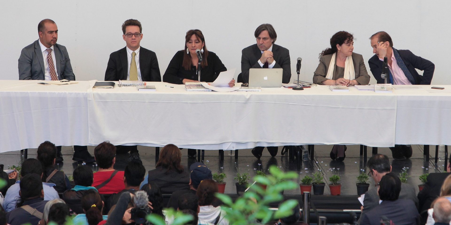 epa05276202 Members of Interdisciplinary Group of Independent Experts (GIEI), (L-R) Alejandro Valencia, Omar Gomez, Angela Buitrago, Carlos Beristain, Claudia Paz and Francisco Cox present their second report on the case of the 43 missing Mexican students of the school of Ayotzinapa, who were last seen on 26 September 2014 in Iguala, Guerrero State, in Mexico City, Mexico, 24 April 2016. The group investigating the violent facts related to the students' disappearance presented its second report.  EPA/SASHENKA GUTIERREZ