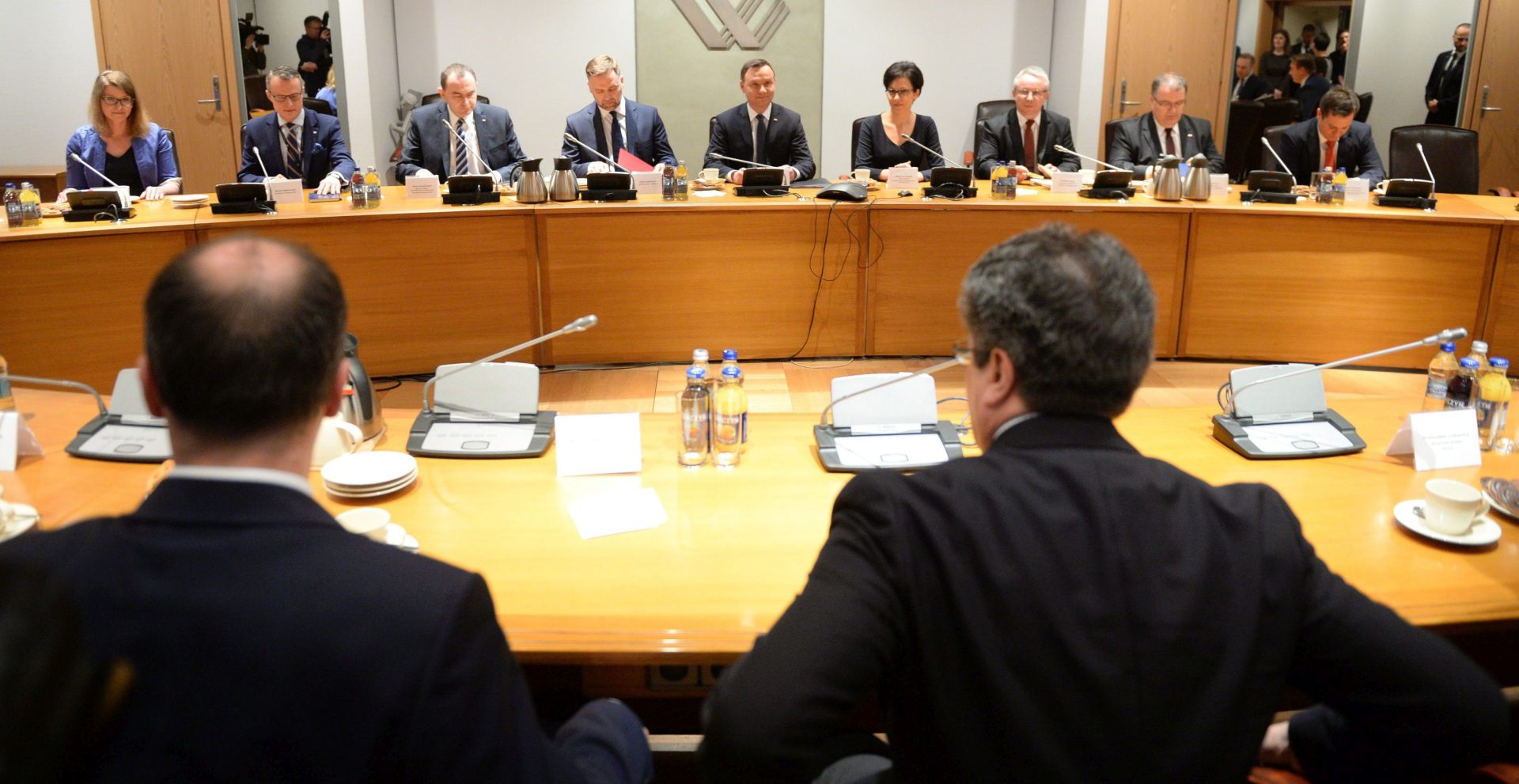 epa05255448 Polish President Andrzej Duda (C) and Warsaw Stock Exchange President Malgorzata Zaleska (4-R) at a meeting with representatives of companies listed on the WIG20 index of the WSE as part of the inauguration of the Warsaw Stock Exchange (WSE) 25th anniversary celebrations at the WSE in Warsaw, Poland, 12 April 2016. On 12 April 1991 the founding act of the Stock Exchange in Warsaw was signed. In recent years WSE has become one of Europe's most dynamic IPO markets.  EPA/JACEK TURCZYK POLAND OUT