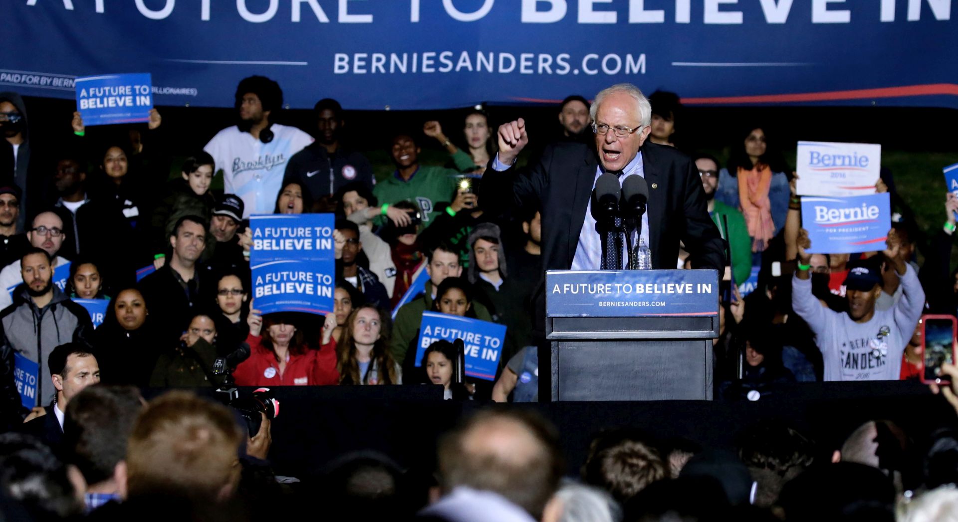 epa05238524 US Senator from Vermont and Democratic presidential candidate Bernie Sanders speaks at a campaign rally in Saint Mary's Park in the Bronx, New York, New York, USA, 31 March 2016. Sanders is coming off wins against Hillary Clinton in Democratic contests in Alaska, Hawaii and Washington State.  EPA/PETER FOLEY