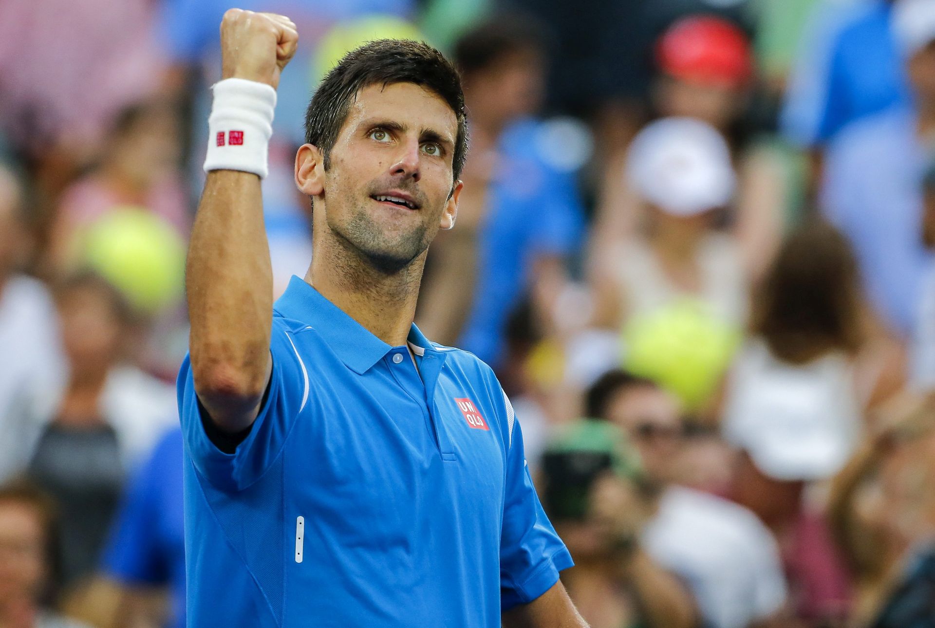 epa05235521 Novak Djokovic of Serbia reacts after defeating Dominic Thiem of Austria during a fourth round match at the Miami Open tennis tournament on Key Biscayne, Miami, Florida, USA, 29 March 2016.  EPA/ERIK S. LESSER