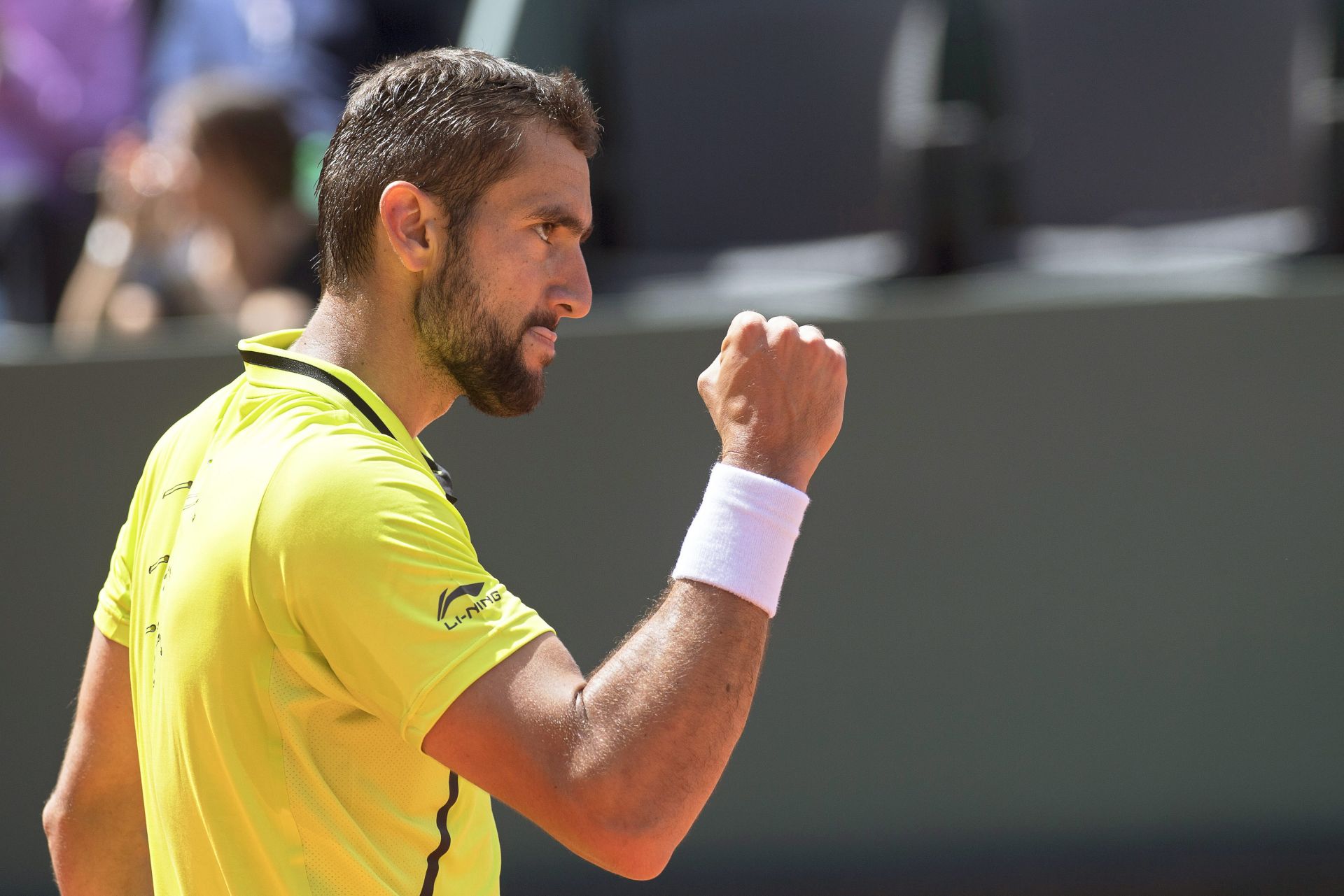 epa05319156 Marin Cilic of Croatia reacts after winning a point against David Ferrer of Spain during their semi final match of the Geneva Open ATP 250 tennis tournament in Geneva, Switzerland, 20 May 2016.  EPA/MARTIAL TREZZINI