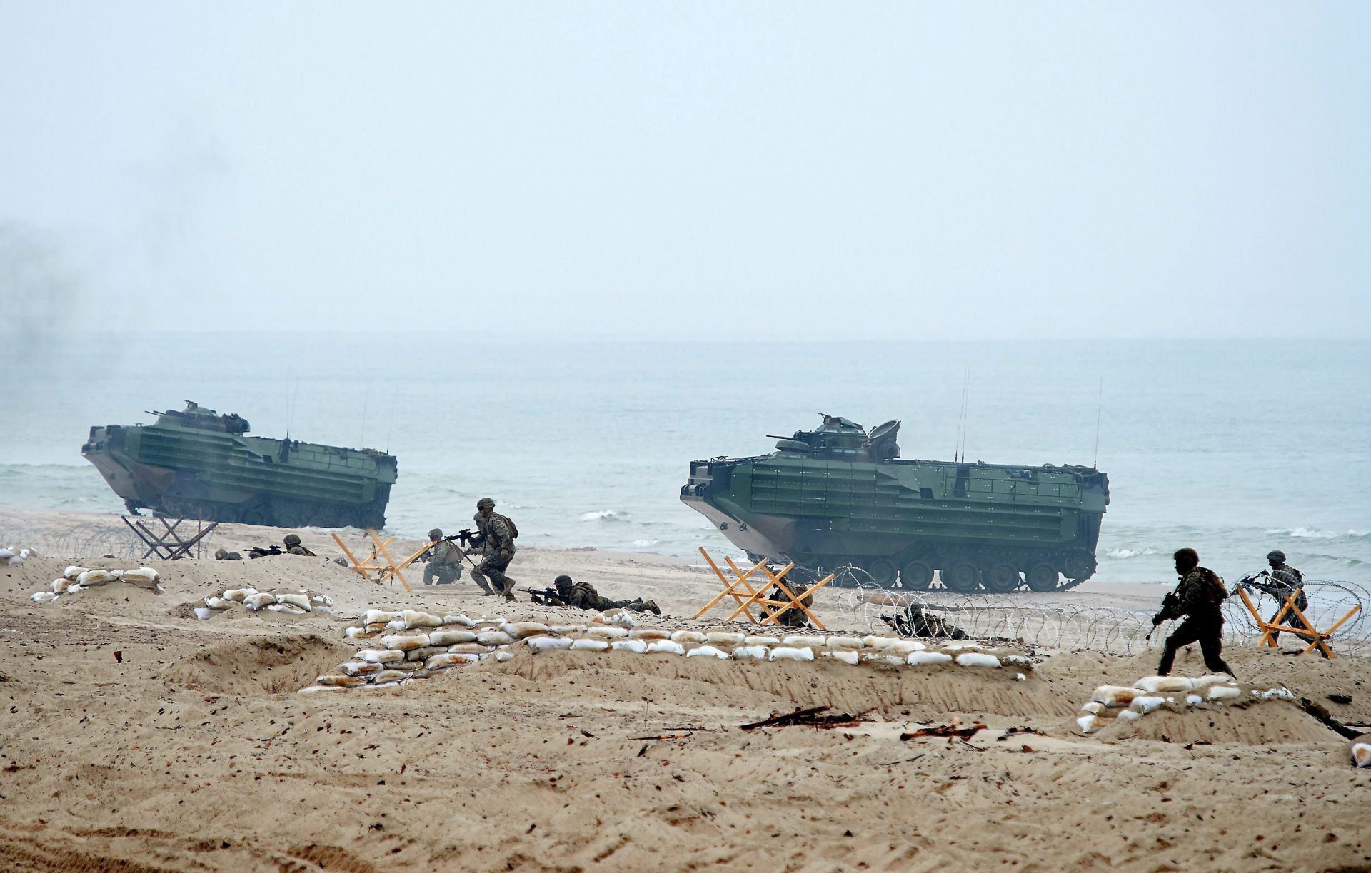 epa05368647 Soldiers take part in the Baltops military exercise in Ustka, northern Poland, 16 June 2016. In all, over 6,000 maritime, ground and air force troops are taking part in the exercise in Estonia, Finland, Germany, Sweden and Poland. The largest and the most important NATO exercise in the Baltic Sea involves Polish troops, vessels of the Polish Navy, along with the Polish Air Force. Baltops 2016 operation, to last until June 19, is the largest NATO exercise in the Baltic region.  EPA/ADAM WARZAWA POLAND OUT