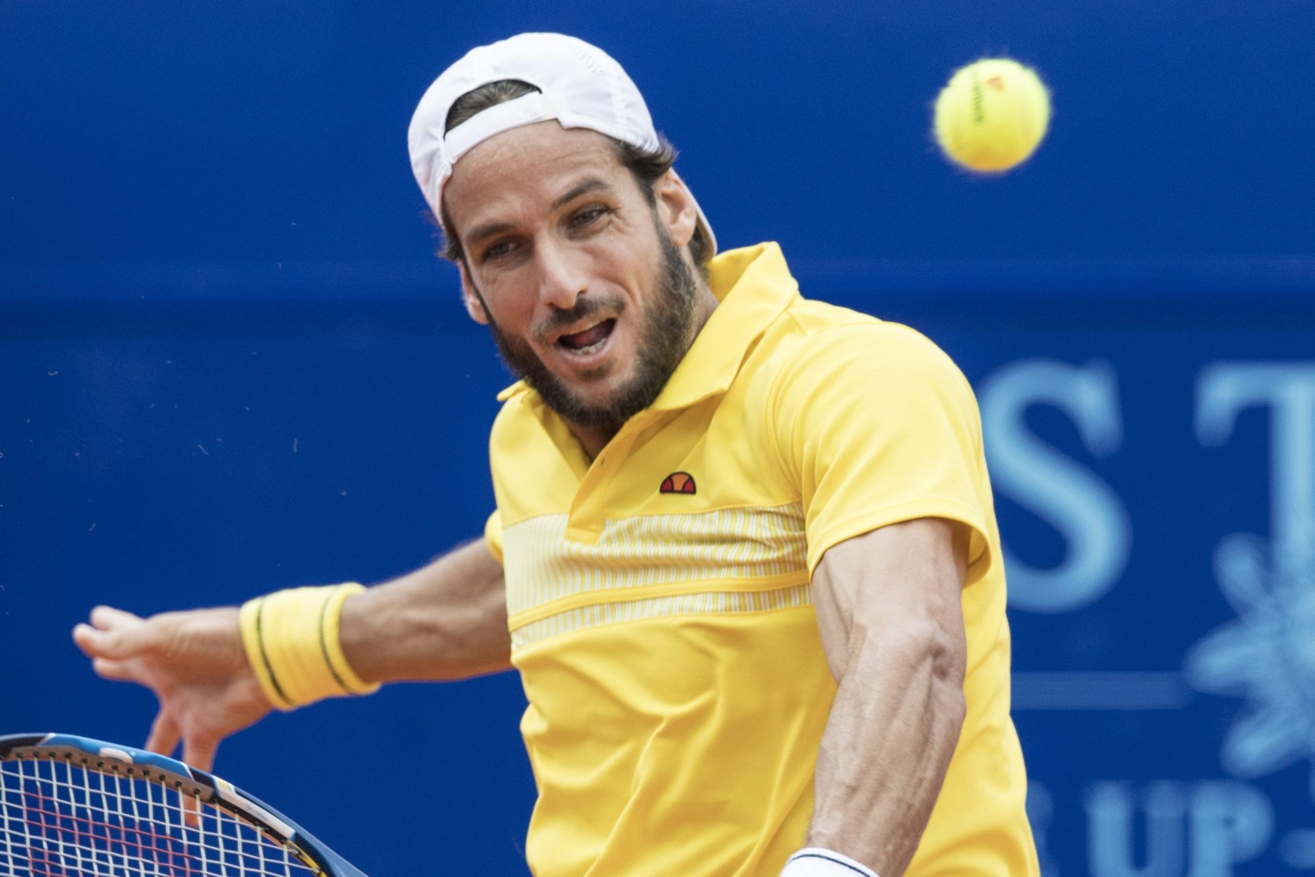 epa05437840 Feliciano Lopez of Spain in action against Dustin Brown of Germany after their semi final game at the Suisse Open tennis tournament in Gstaad, Switzerland, Saturday, July 23, 2016.  EPA/PETER SCHNEIDER