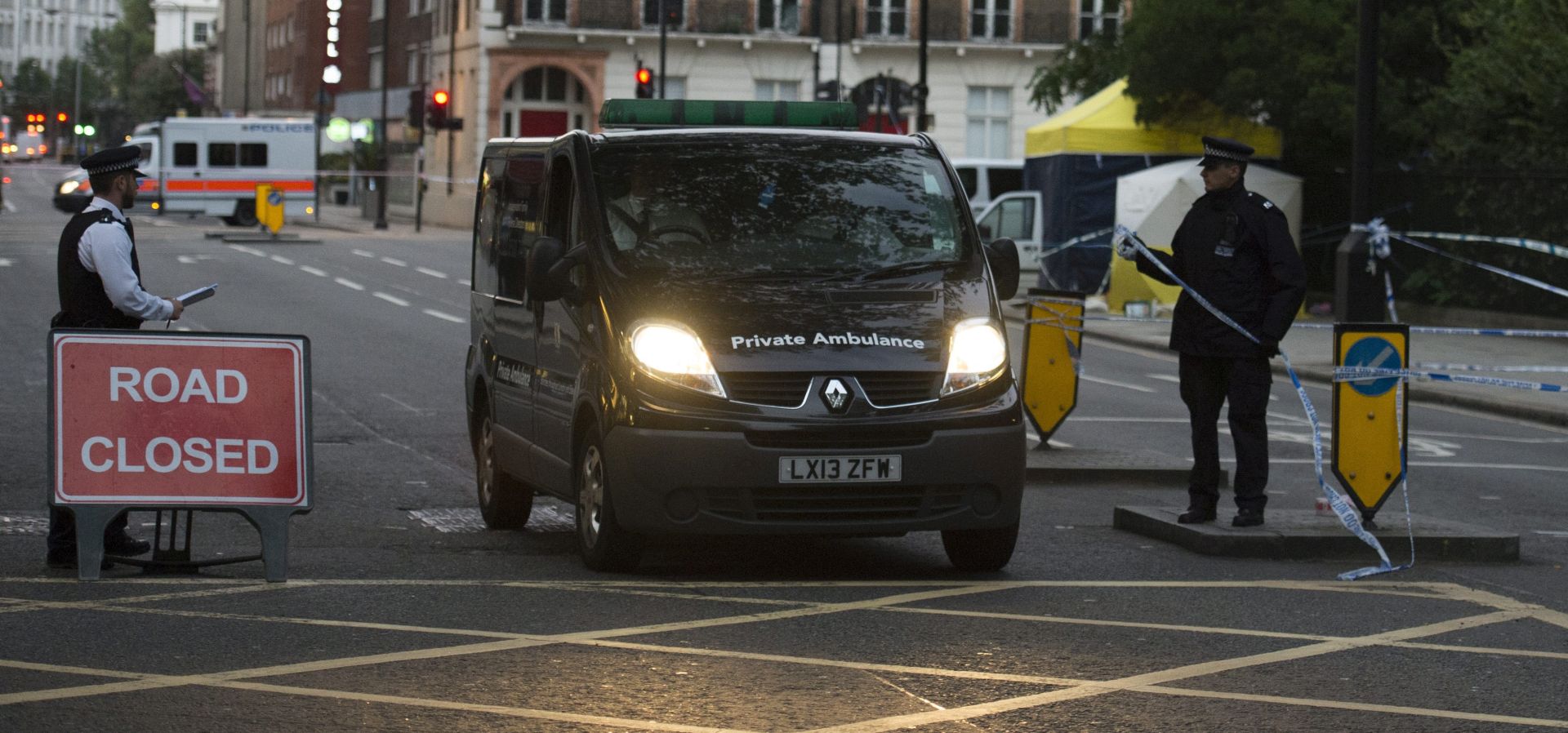 epa05454392 A private ambulance drives away from the scene where one women died and several were injured in a suspected knife attack in Russell Square, Central London, Britain, 04 August 2016. Police and Ambulance services were called to the area on the evening of 03 August where a man was arrested. Police have not ruled out a motive of terrorism.  EPA/WILL OLIVER