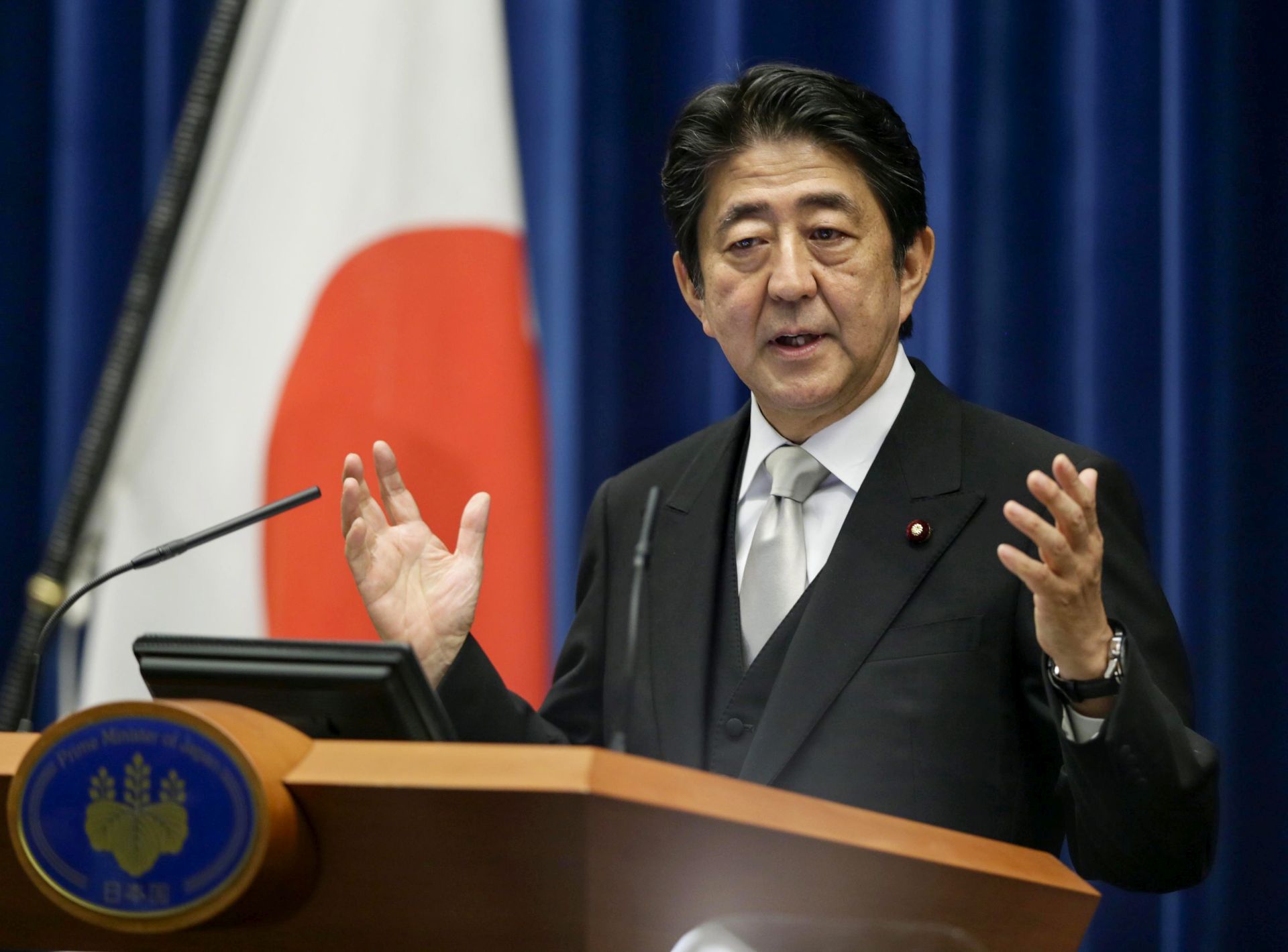epa05452878 Japanese Prime Minister Shinzo Abe speaks during a news conference held at the Prime Minister's official residence in Tokyo, Japan, 03 August 2016. Abe announced the reshuffling of his cabinet.  EPA/KIMIMASA MAYAMA