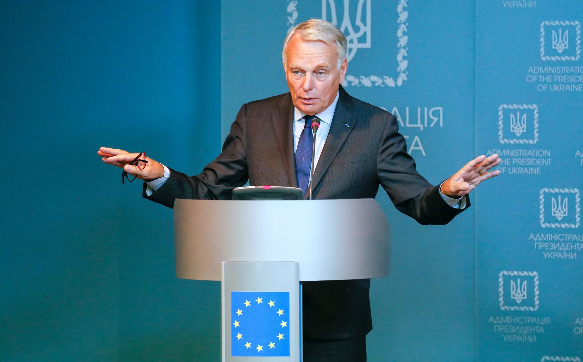 epa05539568 Jean-Marc Ayrault, Minister of Foreign Affairs and International Development of France, speaks during a joint news conference with Ukrainian Foreign Minister Pavlo Klimkin and Minister of Foreign Affairs of Germany, Frank-Walter Steinmeier (both unseen), in Kiev, Ukraine, 14 September 2016. Ayrault and Steinmeier are on a visit for talks with top Ukrainian officials on ways to resolve the conflict in eastern Ukraine and prop up a tentative ceasefire.  EPA/SERGEY DOLZHENKO