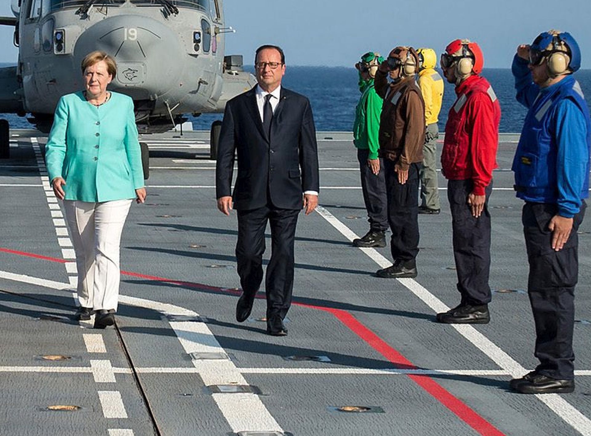 epa05507015 A handout picture provided by the Bundesregierung on 22 August 2016 shows Italian Prime Minister Matteo Renzi (C-L) French President Francois (C-R) Hollande and German Chancellor Angela Merkel (C) arriving for their meeting in Ventotene island, Tirreno sea, Italy, 22 August 2016. The leaders of Italy, France and Germany went to one of the birthplaces of European unity in a symbolic bid to relaunch the European project following Britain's decision to leave the EU.  EPA/Guido Bergmann / Bundesregierung / Handout  HANDOUT EDITORIAL USE ONLY/NO SALES