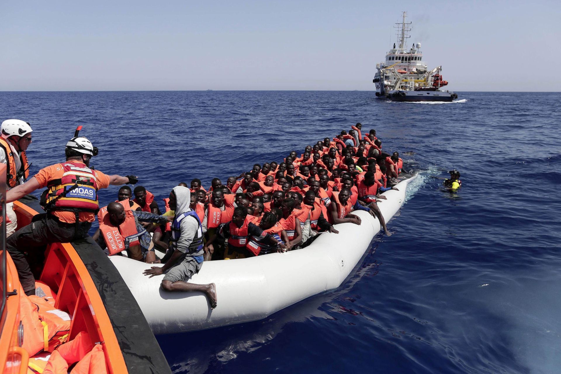 epa05496689 A handout picture taken and released by the Italian Red Cross shows the flagship rescue Responder vessel taking part in a MOAS operation in which 304 migrants were rescued from a dinghy off the Libyan coast, during a rescue operation in the international waters between Malta and Libya, 18 August 2016. Medics from the Italian Red Cross joined forces with the Malta-based foundation MOAS (Migrant Offshore Aid Station) on board its flagship rescue vessel MY Phoenix as it set sail from Malta. The joint mission signals the stepping-up of the Italian Red Cross response to the on-going migration crisis in the Mediterranean.  EPA/YARA NARDI / ITALIAN RED CROSS  / HANDOUT  HANDOUT EDITORIAL USE ONLY/NO SALES