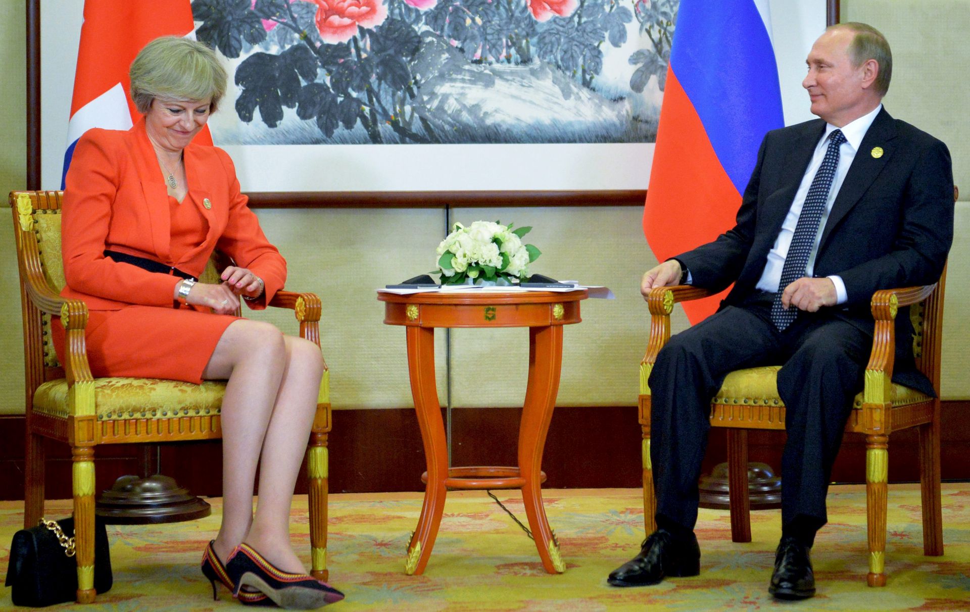 epa05523235 British Prime Minister Theresa May (L) and Russian President Vladimir Putin (R) sit for a bilateral meeting held as part of the G20 Summit in Hangzhou, China, 04 September 2016. The G20 Summit is held in Hangzhou on 04 and 05 September.  EPA/ALEXEY DRUZHINYN /SPUTNIK/KREMLI MANDATORY CREDIT