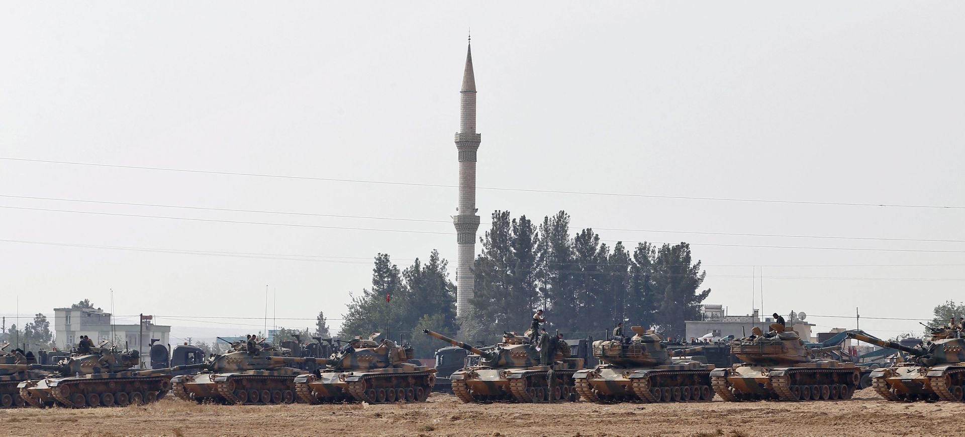 epa05509328 QUALITY REPEAT OF epa05509313

epa05509313 Turkish soldiers stand on tanks as they prepare for a military operation at the Syrian border as part of their offensive against the so-called Islamic State (ISIS or IS) militant group in Syria, in Karkamis district of Gaziantep, Turkey, 25 August 2016. The Turkish army launched an offensive operation against ISIS in Syria's Jarablus with its war jets and army troops in coordination with the US led coalition war planes.  EPA/SEDAT SUNA
