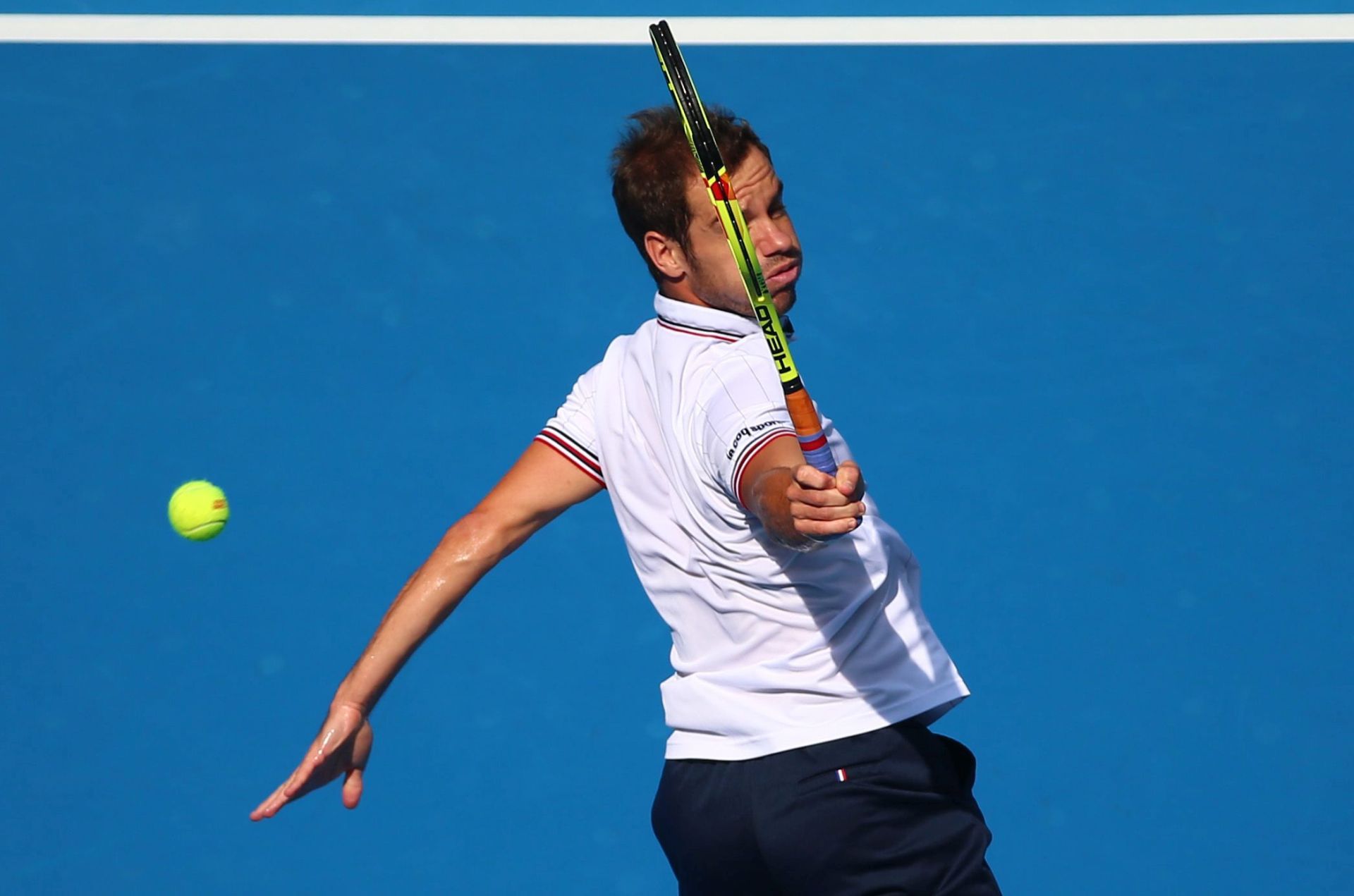 epa05570696 Richard Gasquet of France in action against Sam Querrey of the US during their men's singles first round match of the China Open tennis tournament at the National Tennis Center in Beijing, China, 05 October 2016.  EPA/WU HONG