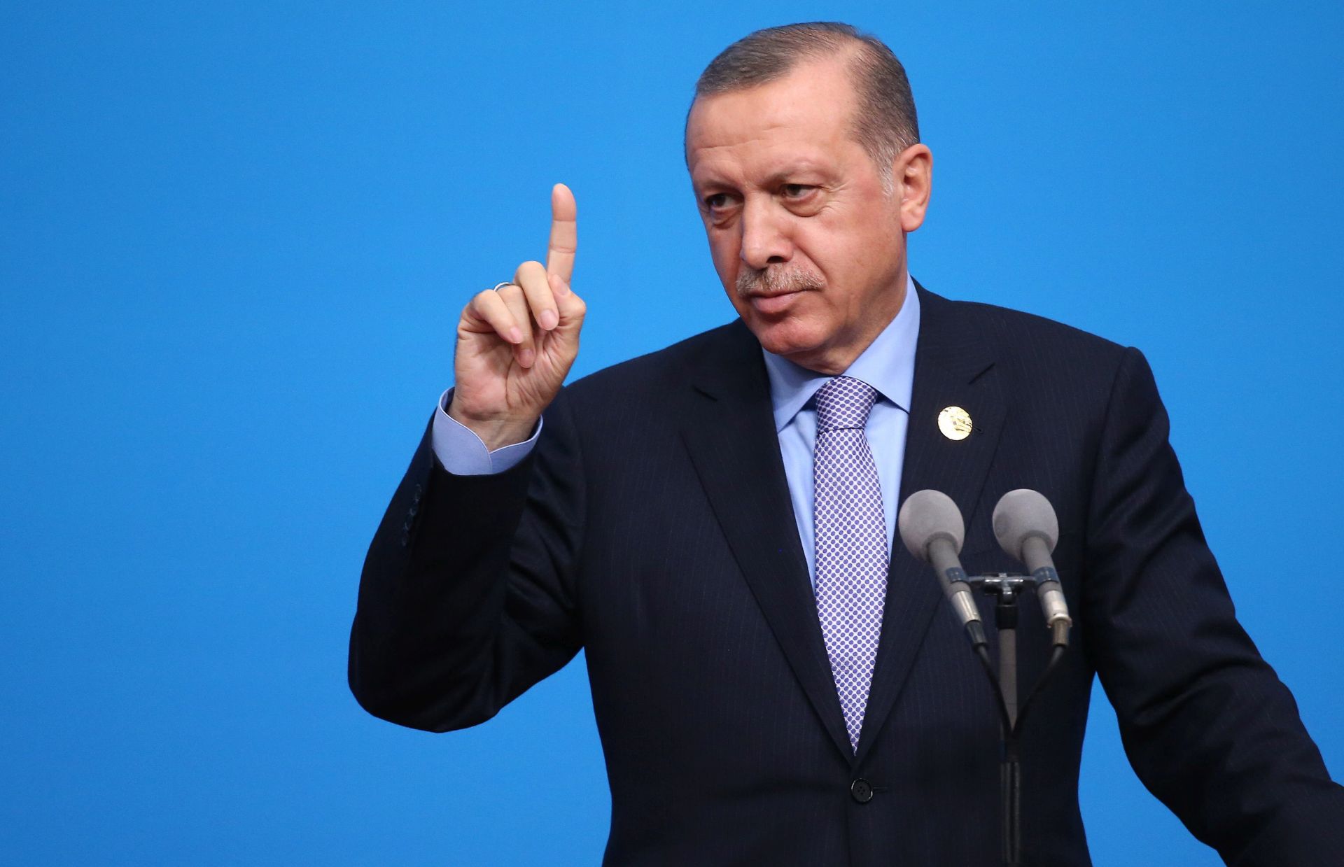 epa05525367 Turkey's President Recep Tayyip Erdogan speaks to reporters during a press conference after the G20 Summit at the Hangzhou International Expo Centre in Hangzhou, China, 05 September 2016.  EPA/HOW HWEE YOUNG