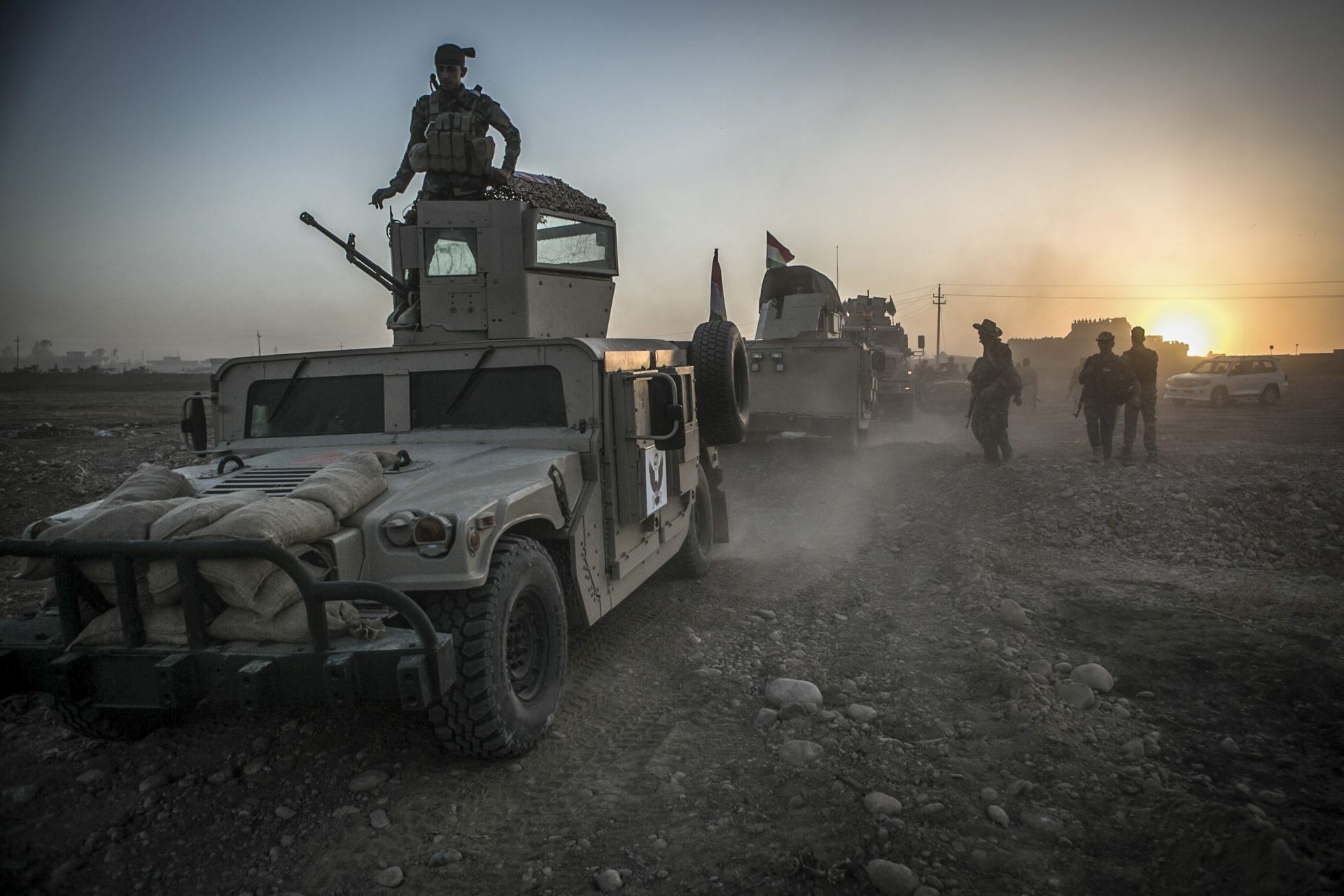 epa05588278 (FILE) A file picture dated 14 August 2016 shows Peshmerga forces leaving a base as they take part in an operation to liberate several villages from the control of the so-called Islamic State (IS or ISIS) militant group, southeast of Mosul, Iraq. Iraqi Prime Minister Haider al-Abadi said on 17 October 2016, that Iraqi forces started their military offensive to recapture the city of Mosul from IS. The operation, led by Kurdish Peshmerga, Iraqi government forces and allies, is backed by the US-led coalition. Iraq's second largest city, Mosul, fell under the jihadist militant group's control in June 2014.  EPA/ANDREA DICENZO