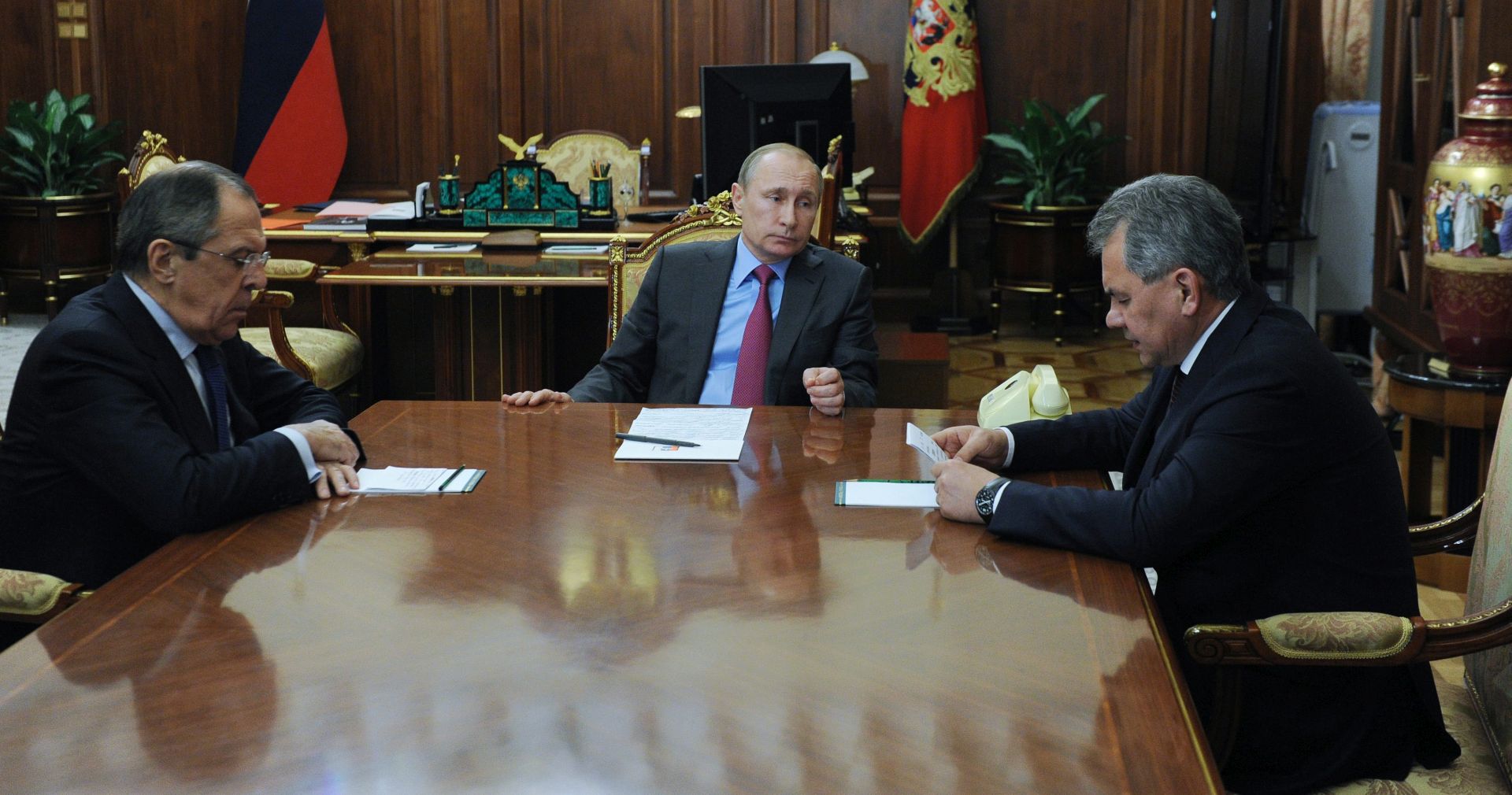 epa05211567 President of Russia Vladimir Putin (C) Russian Minister of Foreign Affairs Sergey Lavrov (L) and Russian Defense Minister Sergey Shoygu during their meeting in the Kremlin, Moscow, Russia, 14 March 2014. Putin has ordered the withdrawal of Russian military troops from Syria, according to media reports.  EPA/MIKHAIL KLIMENTYEV/SPUTNIK/KREMLIN POOL