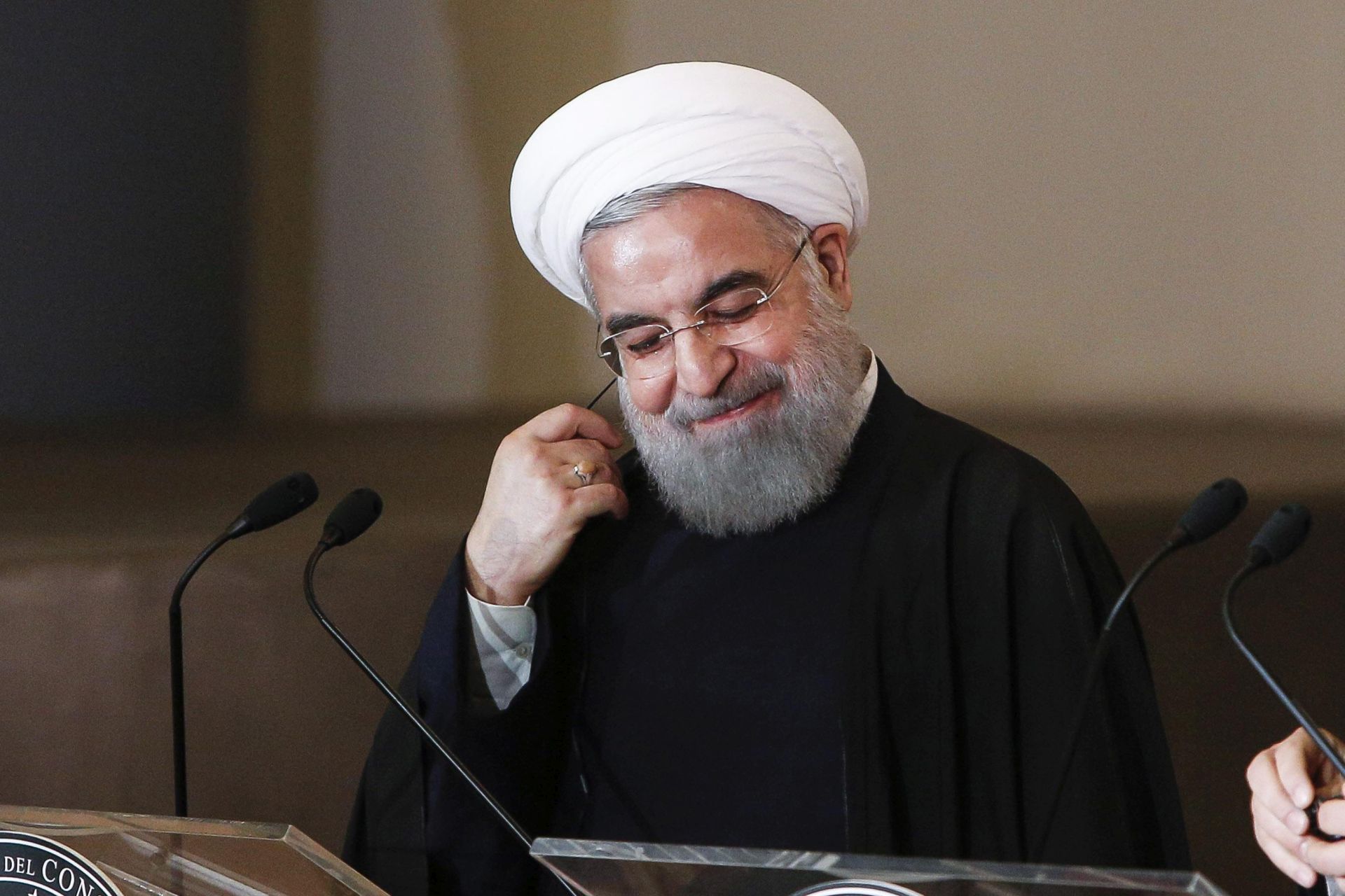 epa05125639 President of the Islamic Republic of Iran Hassan Rouhani during a press conference with Italian Prime Minister Matteo Renzi at Campidoglio Palace in Rome, Italy, 25 January 2016. Rowhani said he was looking to shore up economic ties with European Union countries, as he started a four-day trip to Italy and France that will also include a stop at the Vatican.  EPA/GIUSEPPE LAMI