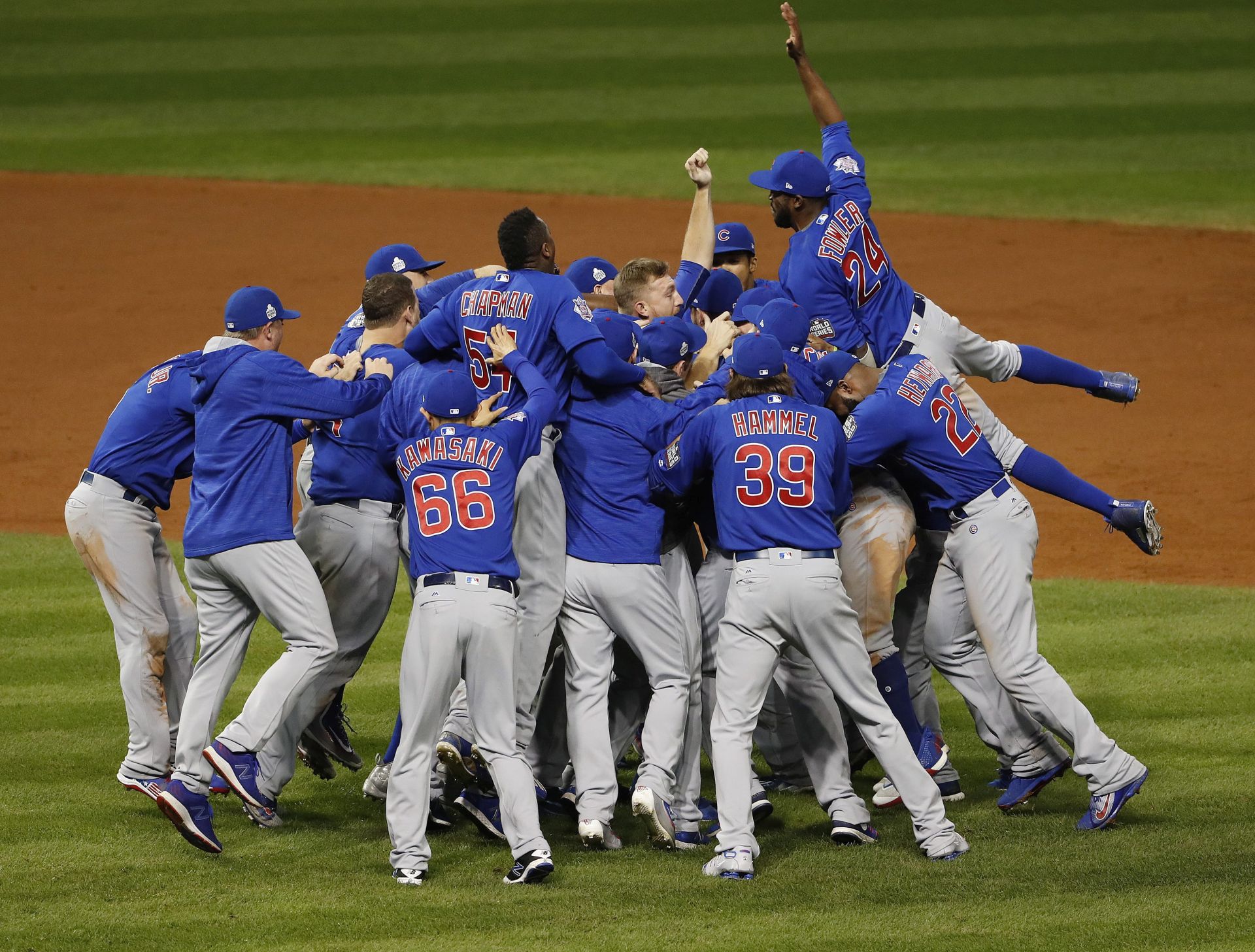 epa05615224 Chicago Cubs players celebrate the final out as the Cubs win the World Series over the Cleveland Indians at Progressive Field in Cleveland, Ohio, USA, 02 November 2016. The Cubs won the best-of-seven series 4-3.  EPA/ERIK S. LESSER