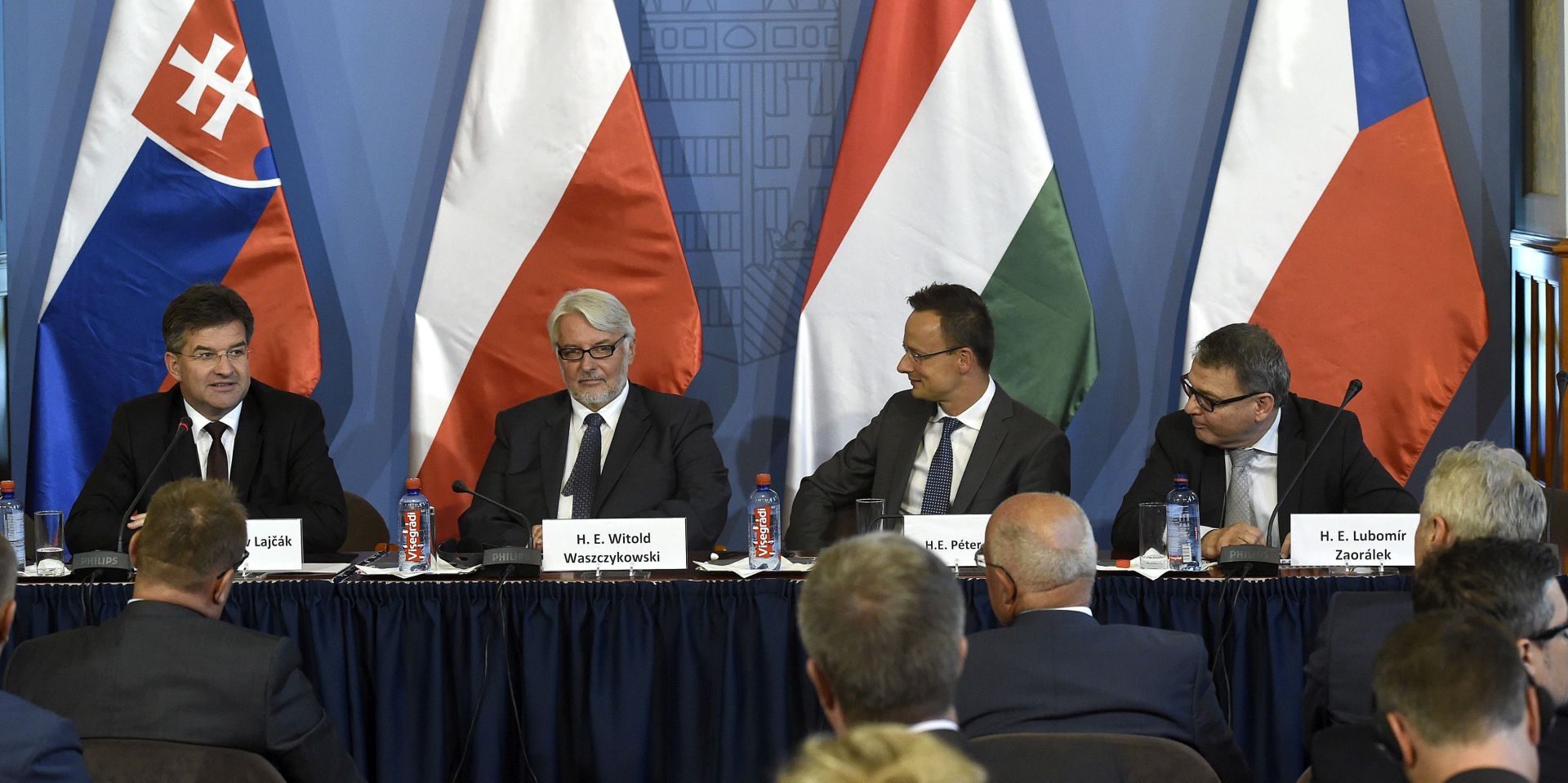epa05514344 Foreign ministers of the Visegrad Group countries (V4) from left to right: Miroslav Lajcak of Slovakia, Witold Waszczykowski of Poland, Peter Szijjarto of Hungary and Lubomir Zaoralek of Czech Republic are seen during the press conference held after their meeting in the Hungarian Ministry of Foreign Affairs and Trade in Budapest, Hungary, 29 August 2016.  EPA/Noemi Bruzak HUNGARY OUT