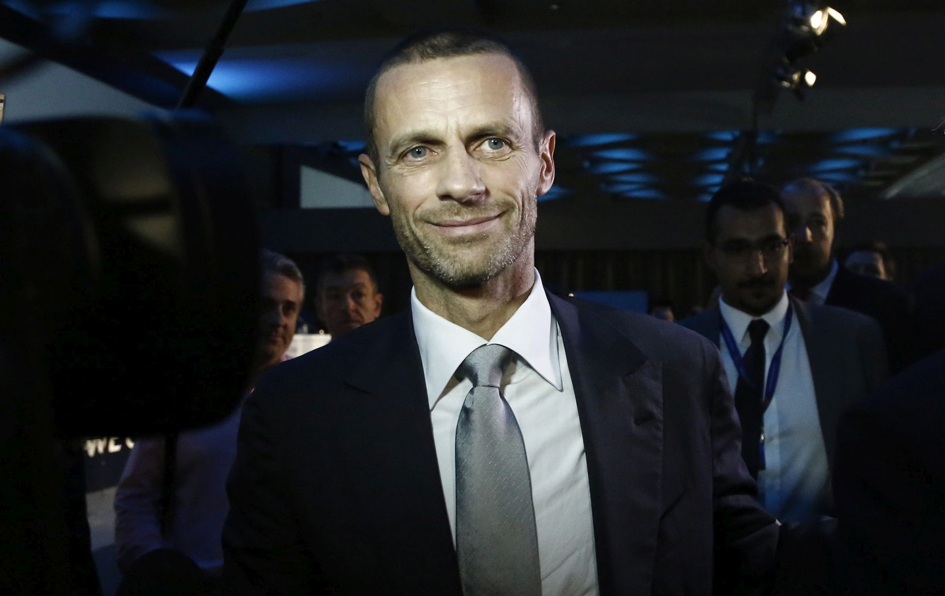 epa05538914 President of the Football Association of Slovenia Aleksander Ceferin (C) reacts after he was elected as the new UEFA President at 12th Extraordinary UEFA Congress in Athens, Greece, 14 September 2016. Michel Platini has been given permission by Fifa's ethics committee to address the Uefa congress in Athens despite his four-year ban from all football-related activity.  EPA/YANNIS KOLESIDIS
