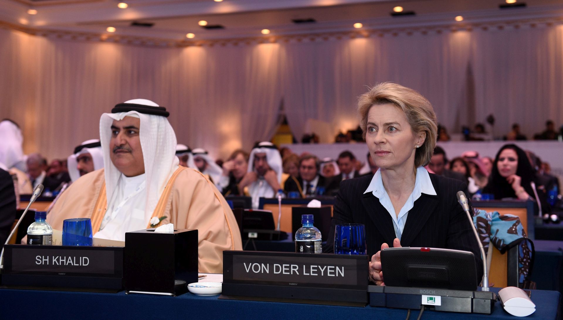 epa05668449 German Defence Minister Ursula von der Leyen (R) joins with Bahrain's Defence Minister Khalid bin Ahmed Al Khalifa as they attend the Manama Dialouge, 'Managing Shifting Regional Dynamics' in Manama, Bahrain, 10 December 2016. The 12th International Institute for Strategic Studies, (IISS) Manama Dialogue is taking place in the Kingdom of Bahrain from 911 December 2016.  EPA/RAINER JENSEN