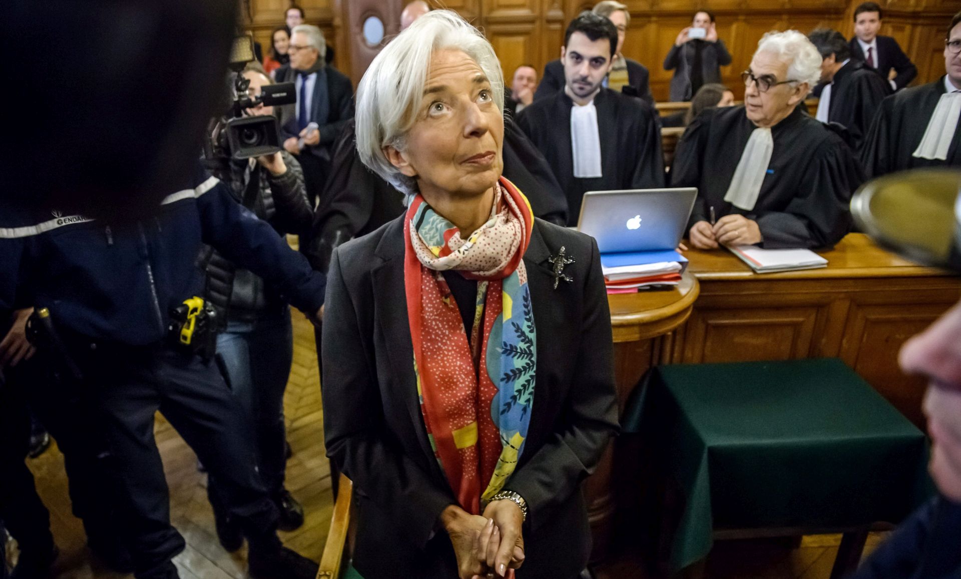 epa05672491 International Monetary Fund (IMF) Managing Director and former Economy Minister Christine Lagarde appears in court at the Plais de Justice, in Paris, France, 12 December 2016. France's highest appeals court ordered on 22 July 2016 Lagarde to stand trial over a state payout to Bernard Tapie. Lagarde was charged for negligence over awarding more than 400 million euro during her time as economy minister in 2008.  EPA/CHRISTOPHE PETIT TESSON