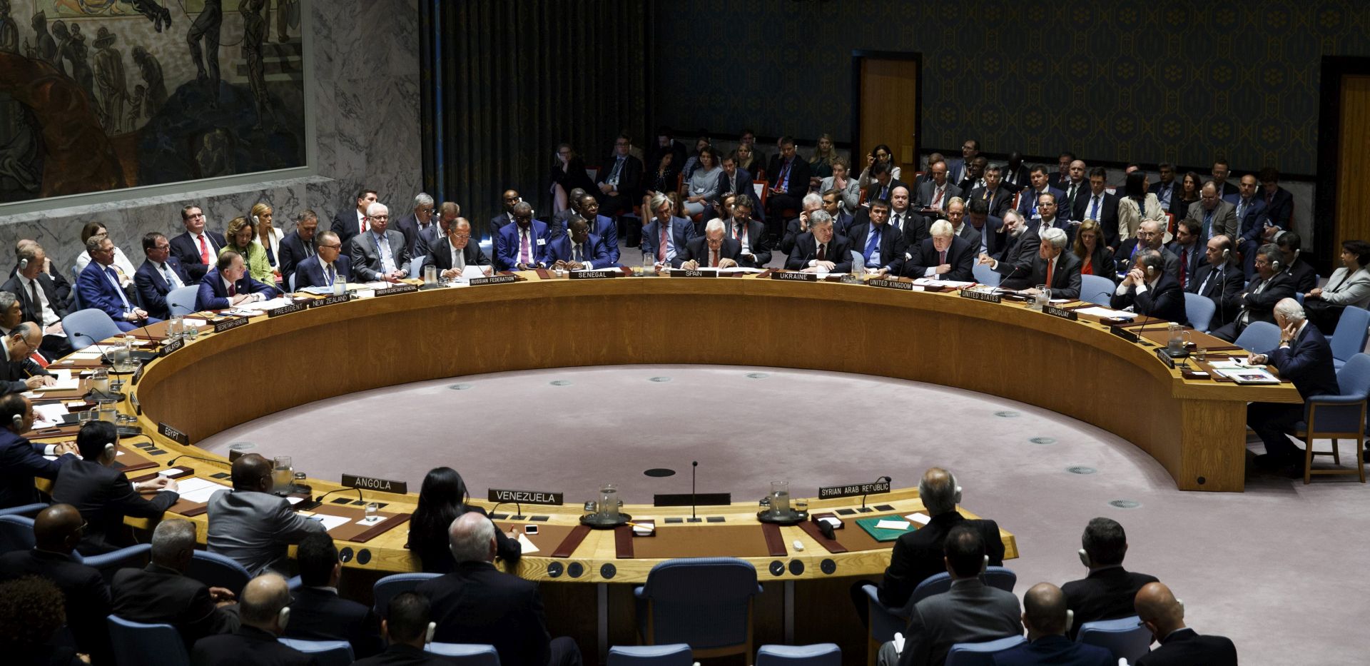 epa05550628 John Kerry (3-R at table), the United States' Secretary of State, speaks directly to Russian involvement in Syria as Sergey Lavrov (8-R at table), the Minister of Foreign Affairs of Russia, and others listen during a Security Council meeting about the situation in Syria on the sidelines of the General Debate of the 71st Session of the United Nations General Assembly at UN headquarters in New York, New York, USA, 21 September 2016.  EPA/JUSTIN LANE
