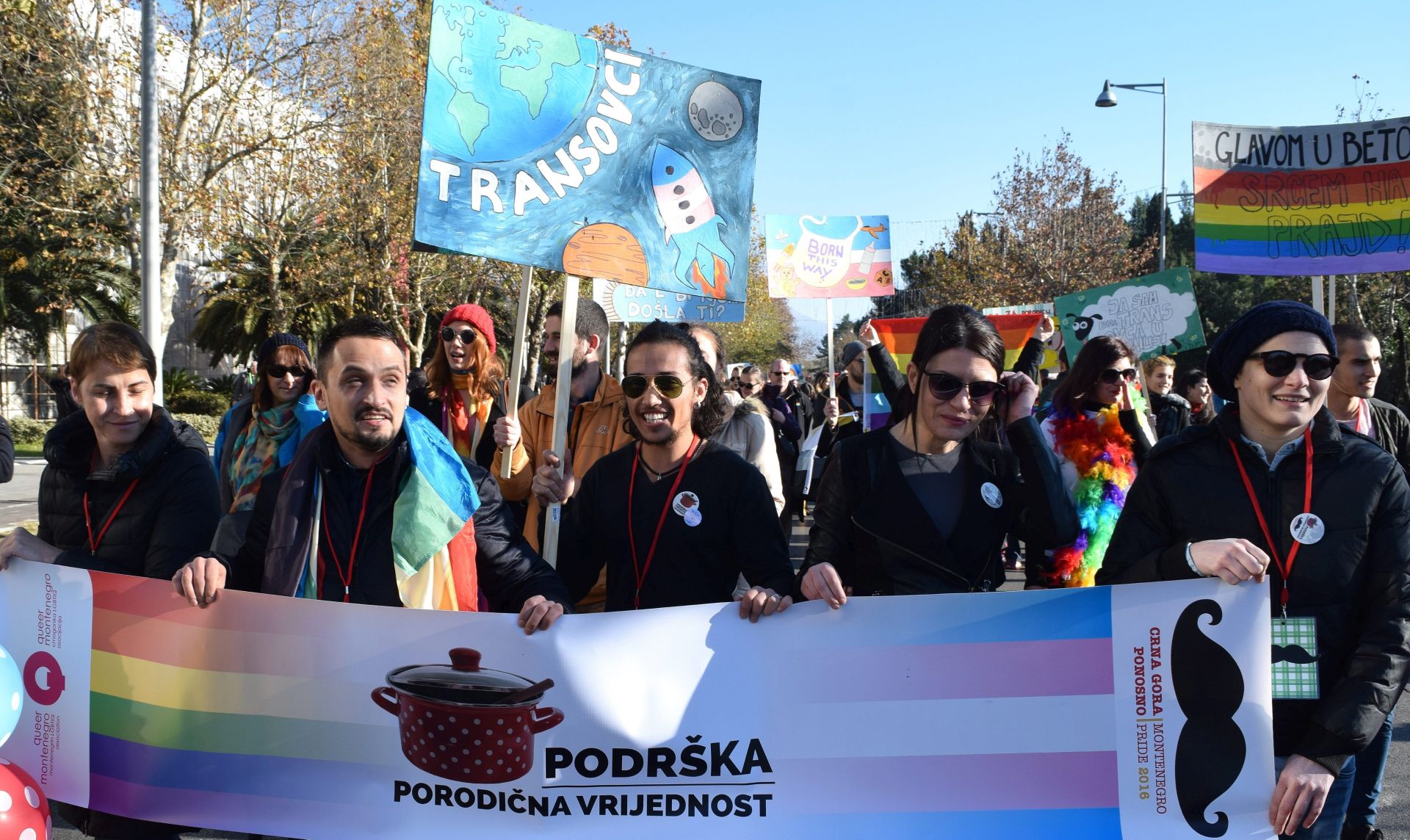 epa05679724 Montenegrin gay activists and supporters carry a banner 'Support - family value' as they take part in the LGBT Pride march in Podgorica, Montenegro, 17 December 2016. According to reports, hundreds of gay activists and supporters marched in the streets of Podgorica calling for more rights. LGBT rights is a controversial issue in Montenegro and elsewhere in the Balkan region, where the society is considered a more conservative one. The task of the government is to boost gay rights as part of efforts to join the European Union.  EPA/BORIS PEJOVIC