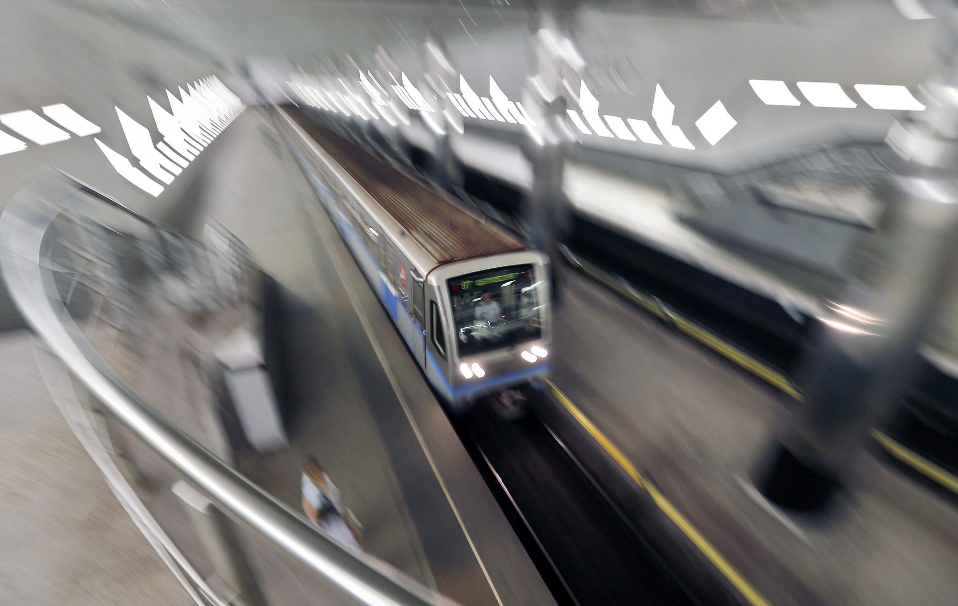 epa05495707 A metro train arrives at the Myakinino metro station near Moscow, Russia, 18 August 2016. Myakinino metro station was opened 29 December 2009, it is located to the northwest of Moscow outside of MKAD ( the Moscow Automobile  Ring Road) close to the Moskva river bank,  near the Crocus Expo International Exhibition Center and Vegas shopping mall. The construction of the station was invested by Crocus group. It was announced that the Myakinino metro station could be closed since 22 August 2016 for entry and exit of passengers for an uncertain period due to violation of safety measures, metro trains will pass the station without stopping.  EPA/YURI KOCHETKOV