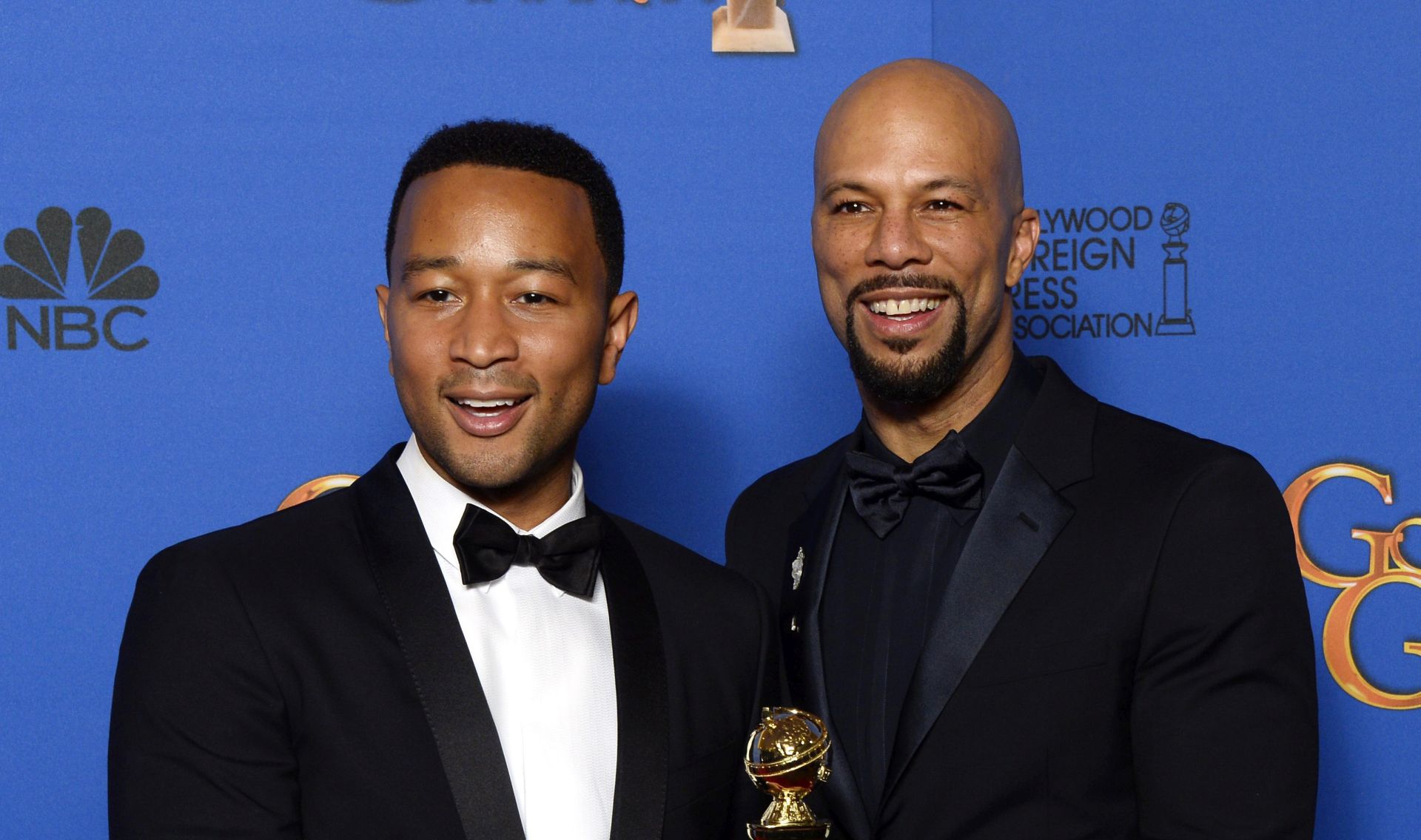 epa04556300 US musicians John Legend (L) and Common (R) pose in the press room with their award for Best Original Song for 'Glory' from the movie 'Selma' during the 72nd Annual Golden Globe Awards at the Beverly Hilton Hotel, in Beverly Hills, California, USA, 11 January 2015.  EPA/PAUL BUCK